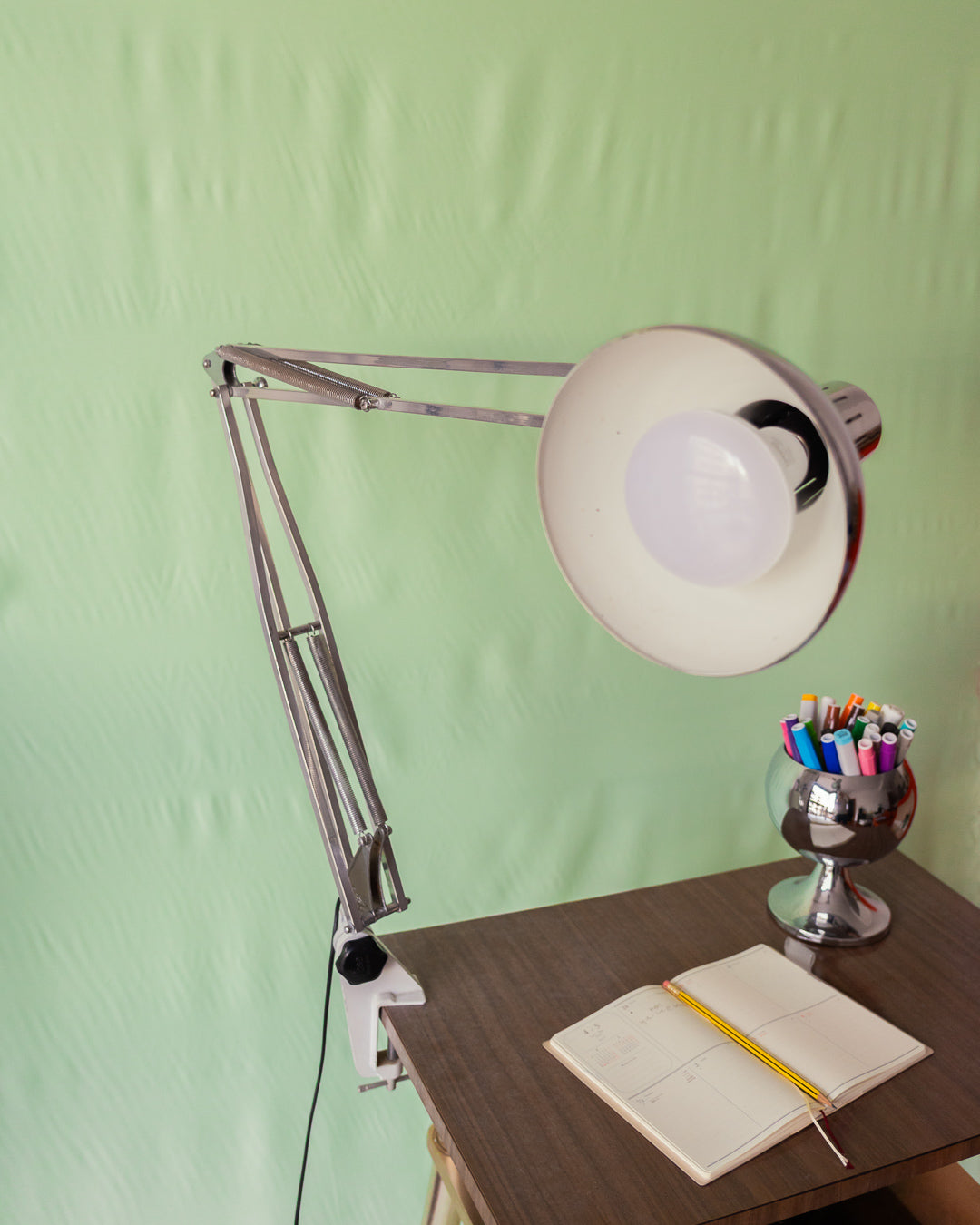 FASE chrome architect desk lamp from the 1960s clamped to a desk – Vecino Shop