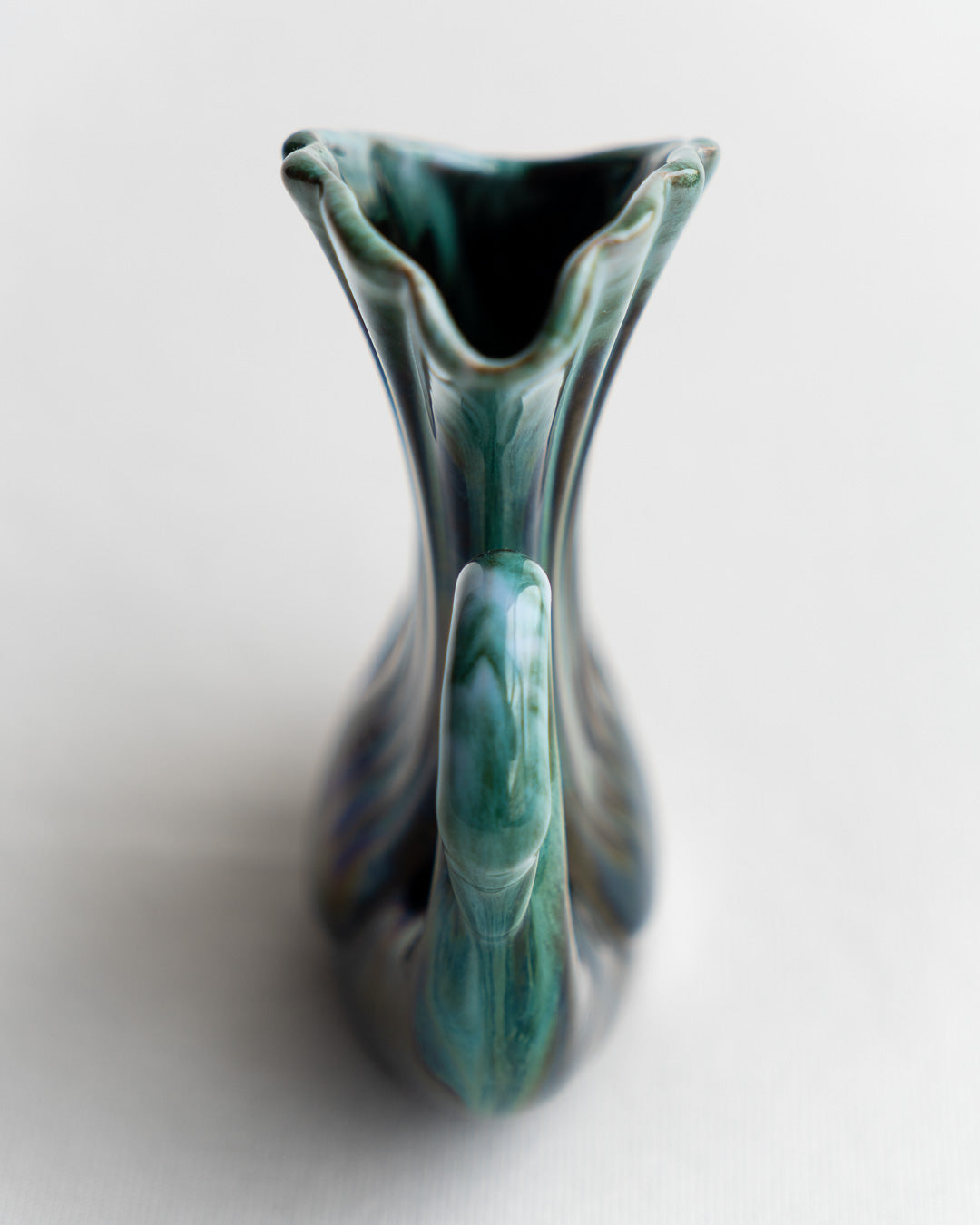 Vintage Blue Mountain Pottery swan-shaped vase with signature blue-green glaze and elegant mid-century modern curves, made in Canada - Vecino Shop