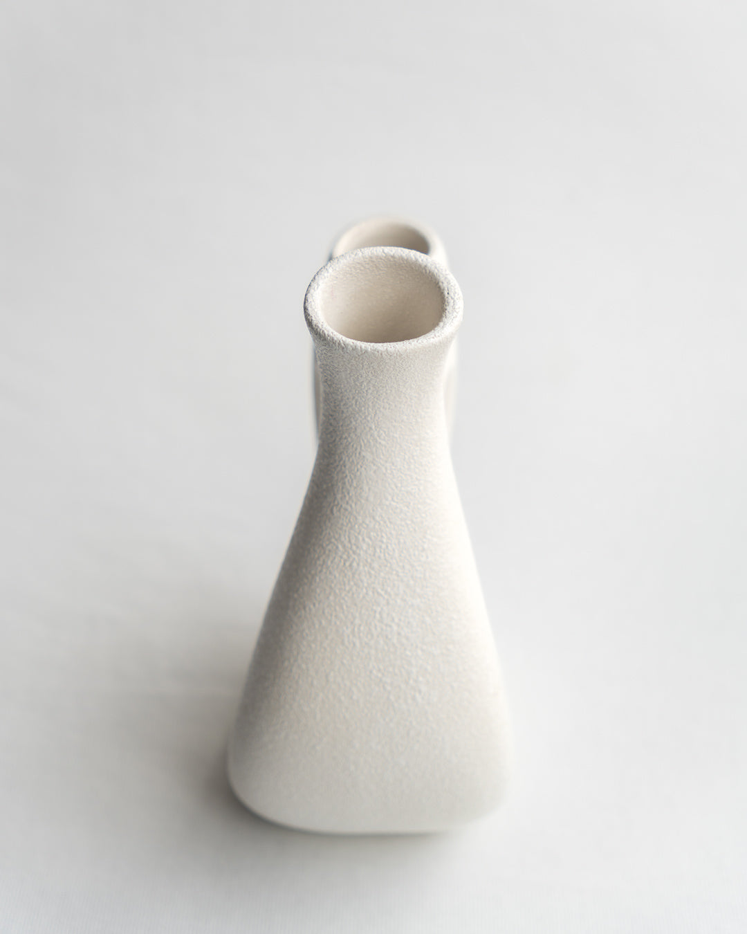 Vintage Italian double vase by Bertoncello with sculptural mid-century design, minimalist form, and textured ceramic glaze - Vecino Shop