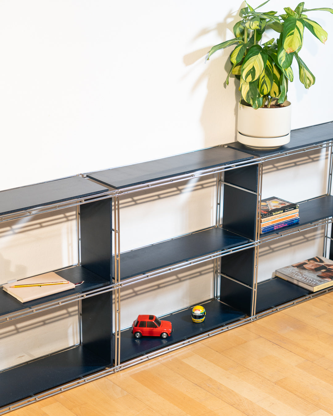 Rare 1960s Multistrux blue chrome modular shelving system with thirteen shelves, restored vintage design piece. Vecino Shop