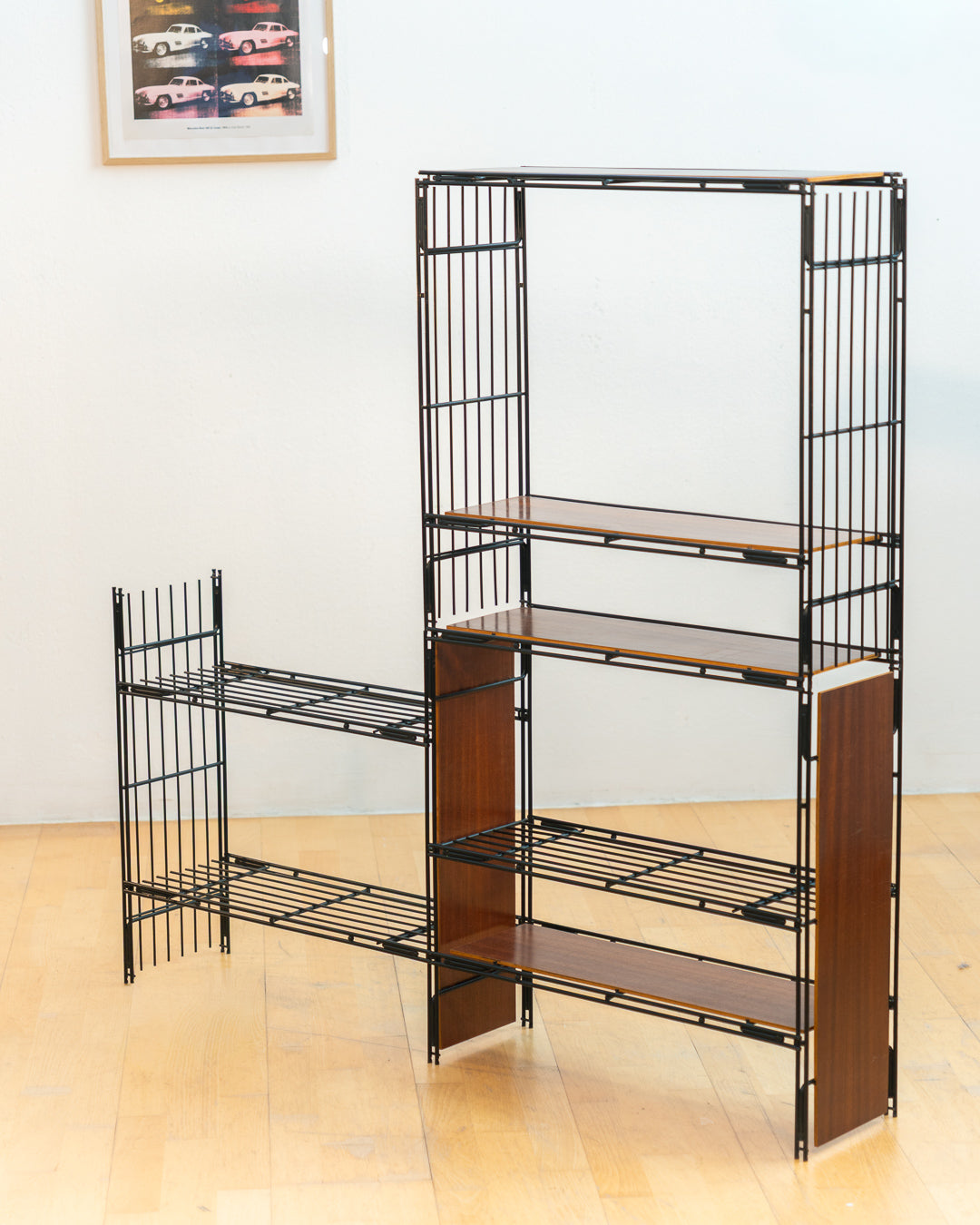 Vintage 1960s teak wood and matte black Multistrux modular string shelving system with twelve shelves, restored vintage design piece. Vecino Shop
