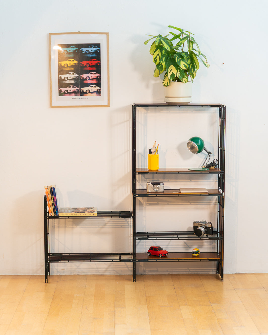 Vintage 1960s teak wood and matte black Multistrux modular string shelving system with twelve shelves, restored vintage design piece. Vecino Shop