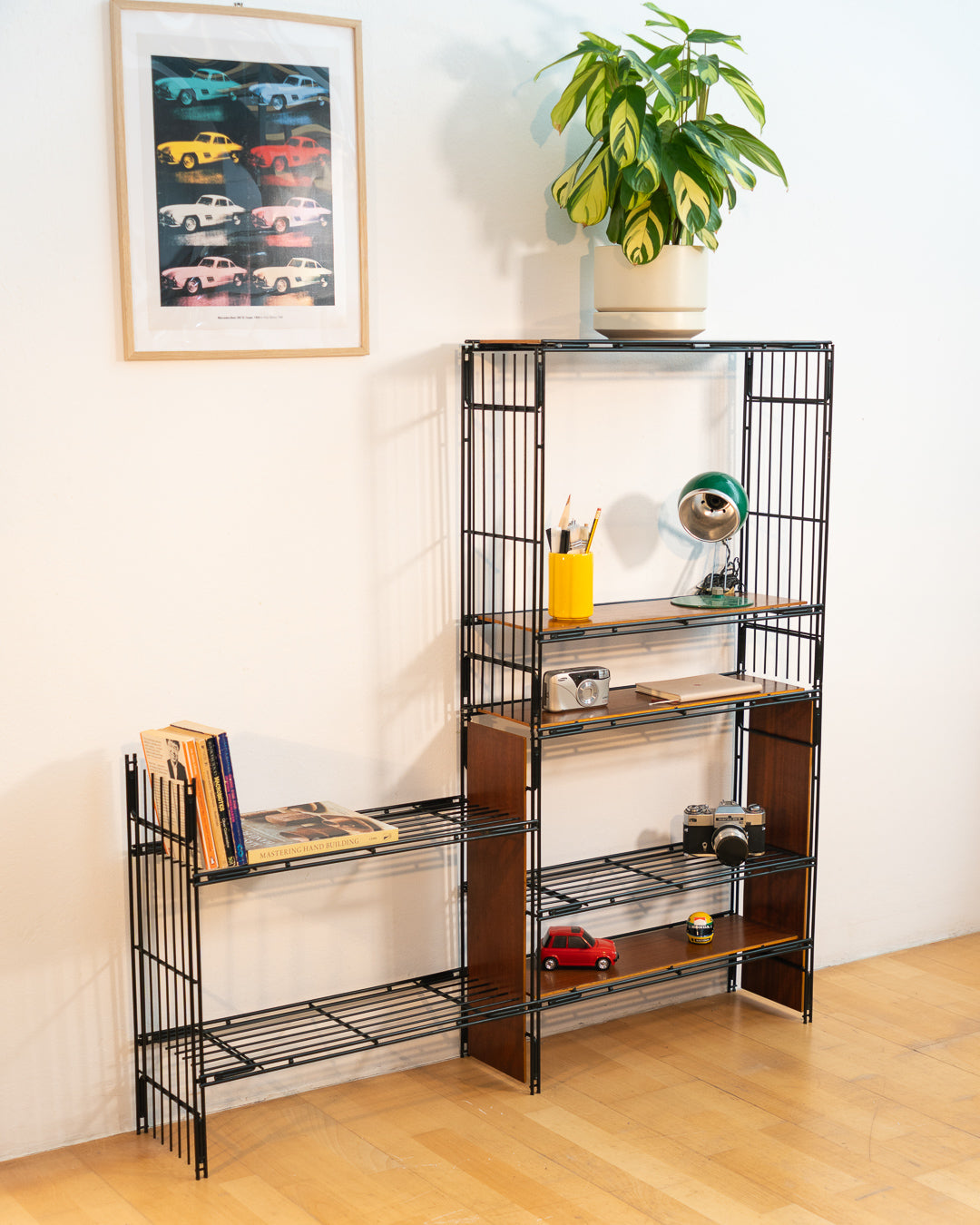 Vintage 1960s teak wood and matte black Multistrux modular string shelving system with twelve shelves, restored vintage design piece. Vecino Shop