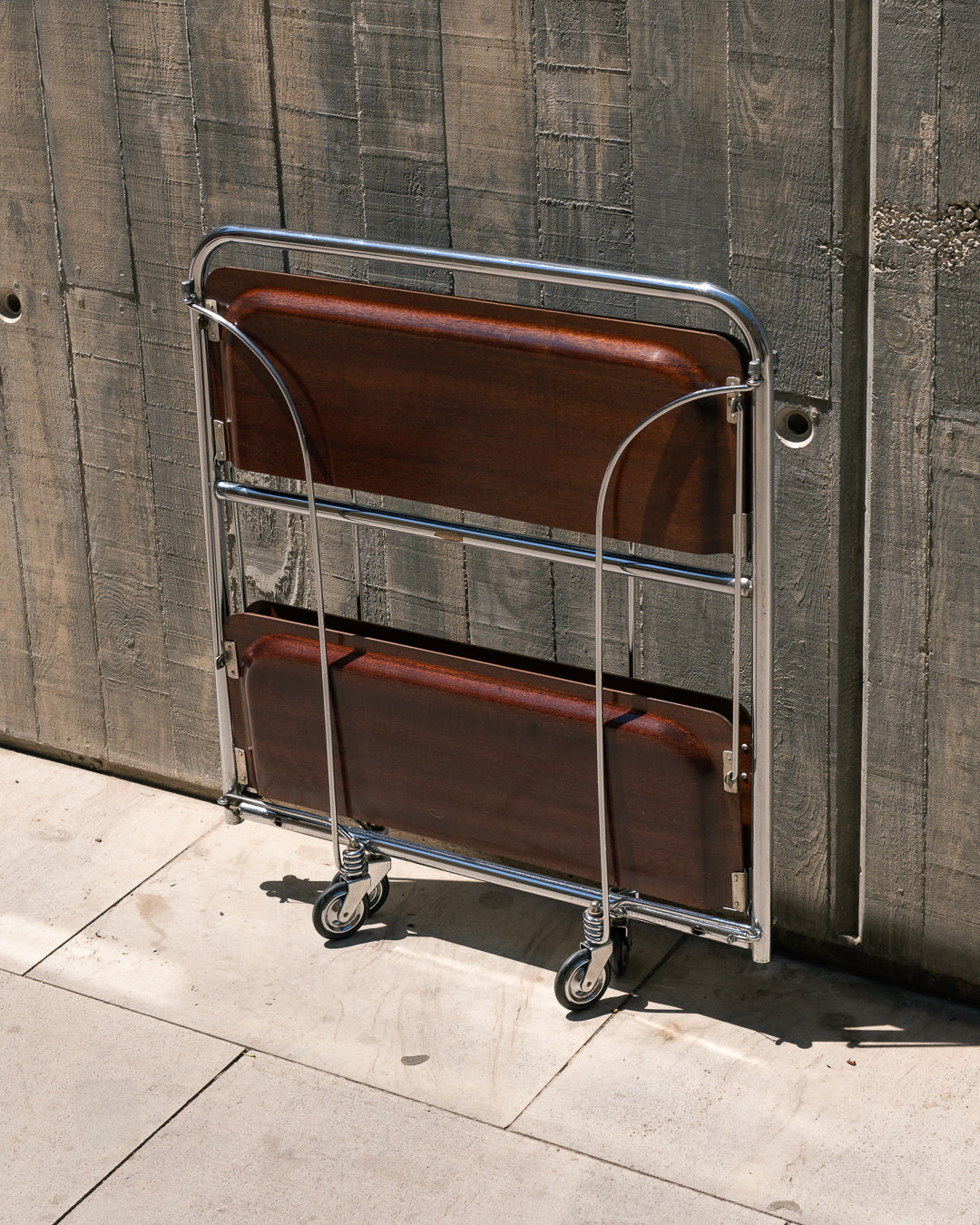Raquer vintage folding bar cart from the 1960s in dark wood finish with lacquered metal frame and wheels – Vecino Shop