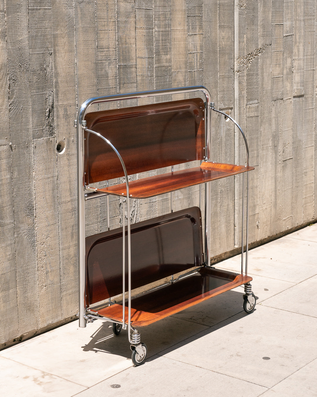 Raquer vintage folding bar cart from the 1960s in dark wood finish with lacquered metal frame and wheels – Vecino Shop