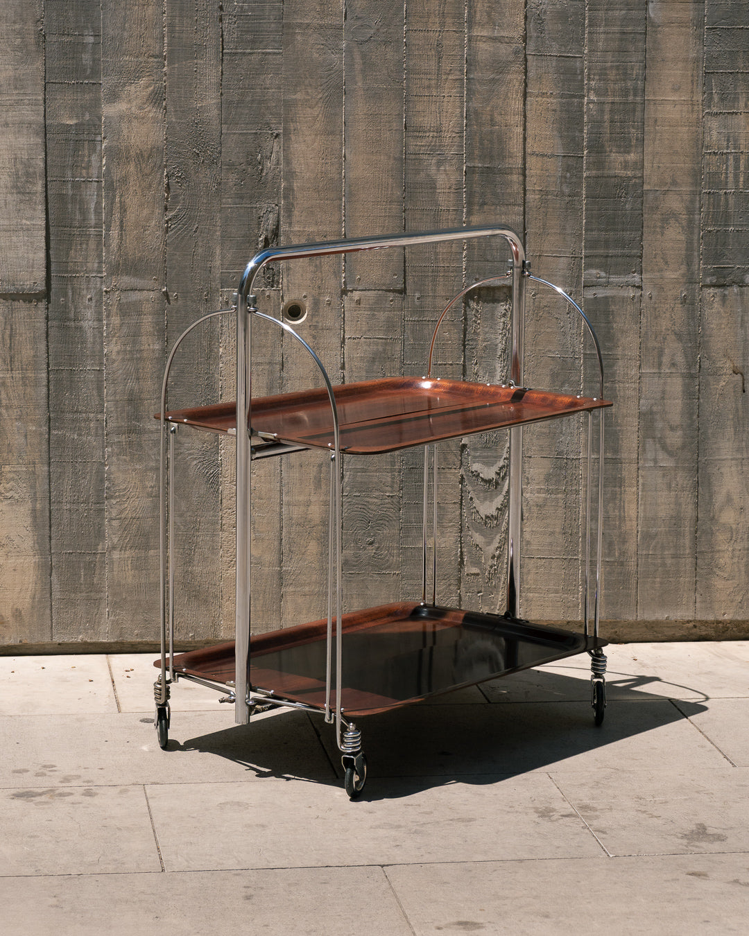 Raquer vintage folding bar cart from the 1960s in dark wood finish with lacquered metal frame and wheels – Vecino Shop
