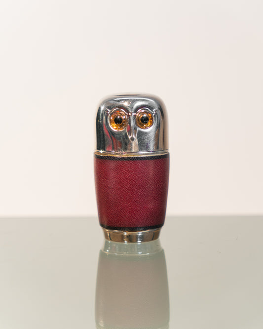 Vintage owl nesting shot glass set from West Germany with chrome head, amber eyes, and leather body. Vecino Shop