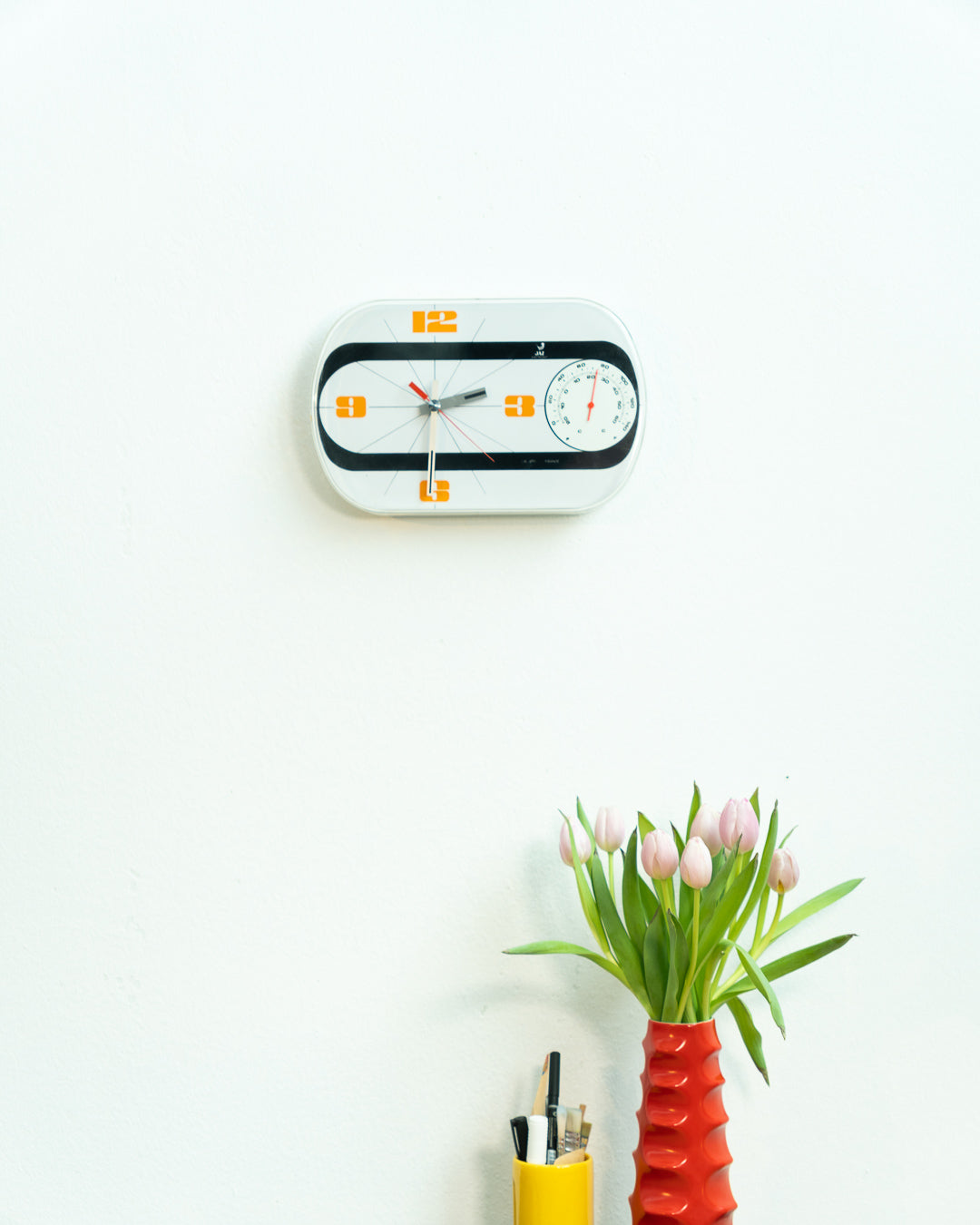 Vintage Jaz Electronic Thermic wall clock in white and orange with thermometer, 1975 French Space Age design. Vecino Shop