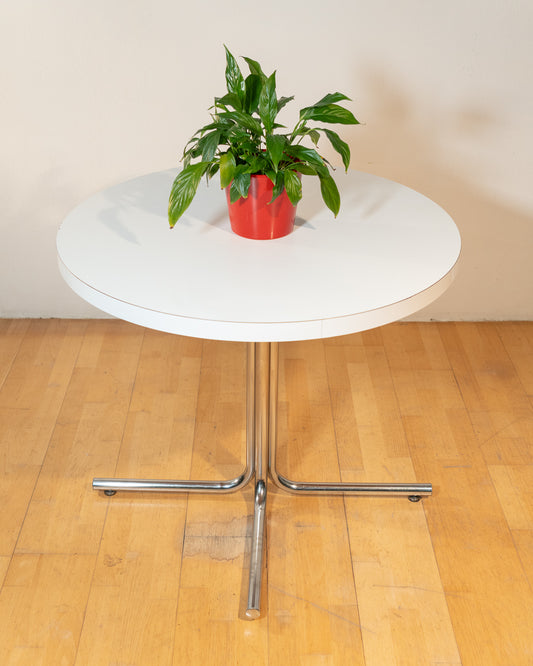 Vintage 1970s Bauhaus dining set with white formica cantilever chairs and chrome pedestal dining table - Mid Century Modern. Vecino Shop