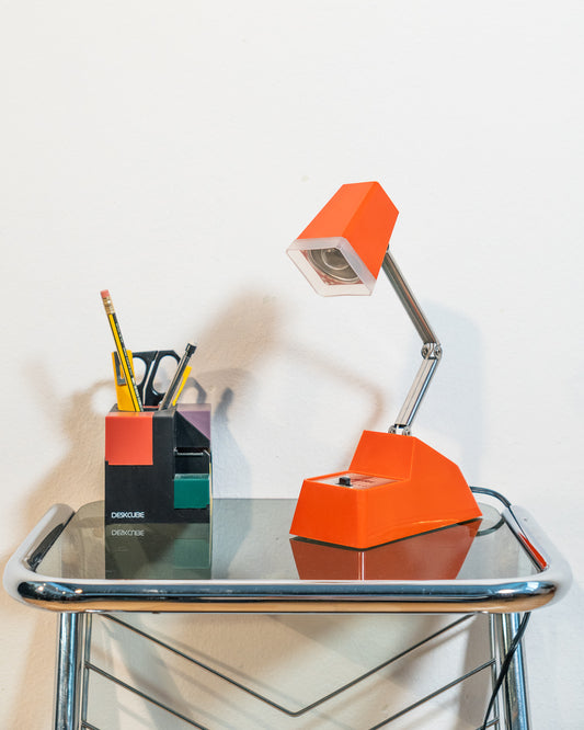 Rare vintage Cleve-Lite JetSet folding lamp in orange plastic. 1970s space age design with night light function. Includes original box– Vecino Shop