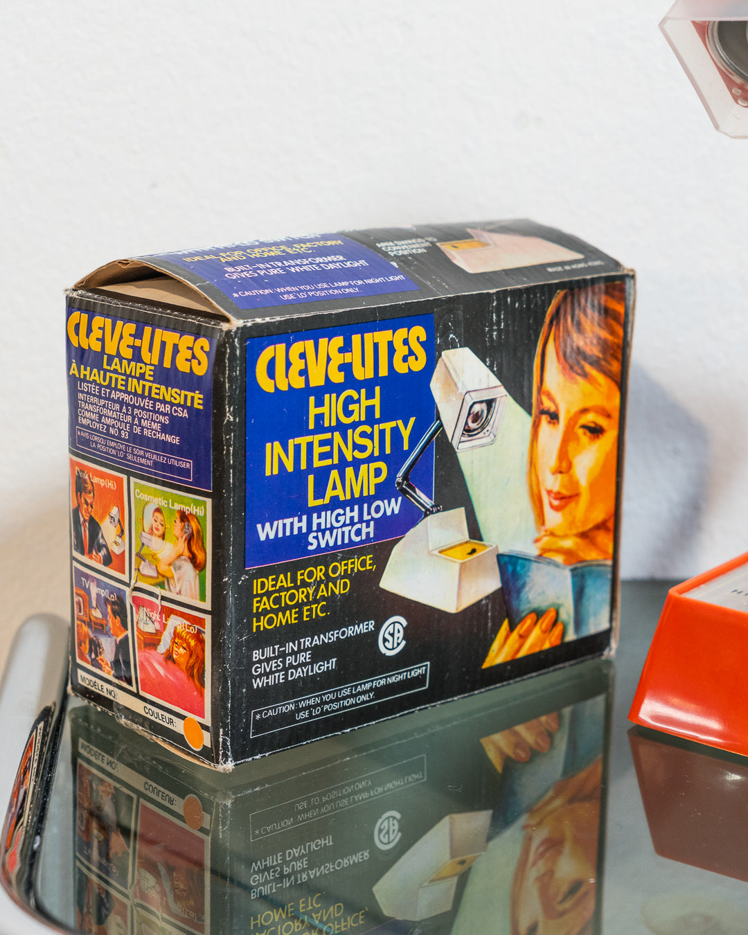 Rare vintage Cleve-Lite JetSet folding lamp in orange plastic. 1970s space age design with night light function. Includes original box– Vecino Shop
