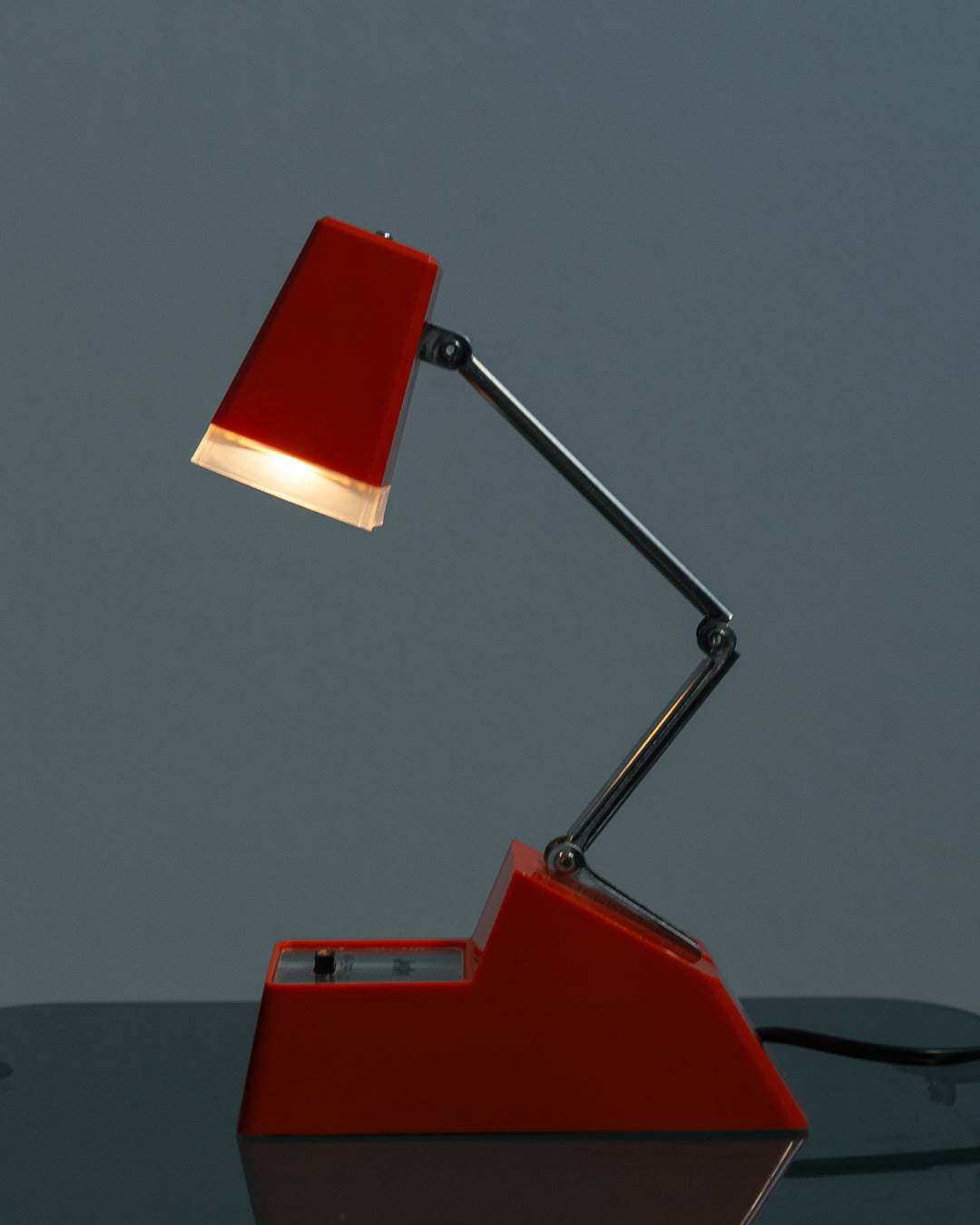 Rare vintage Cleve-Lite JetSet folding lamp in orange plastic. 1970s space age design with night light function. Includes original box– Vecino Shop