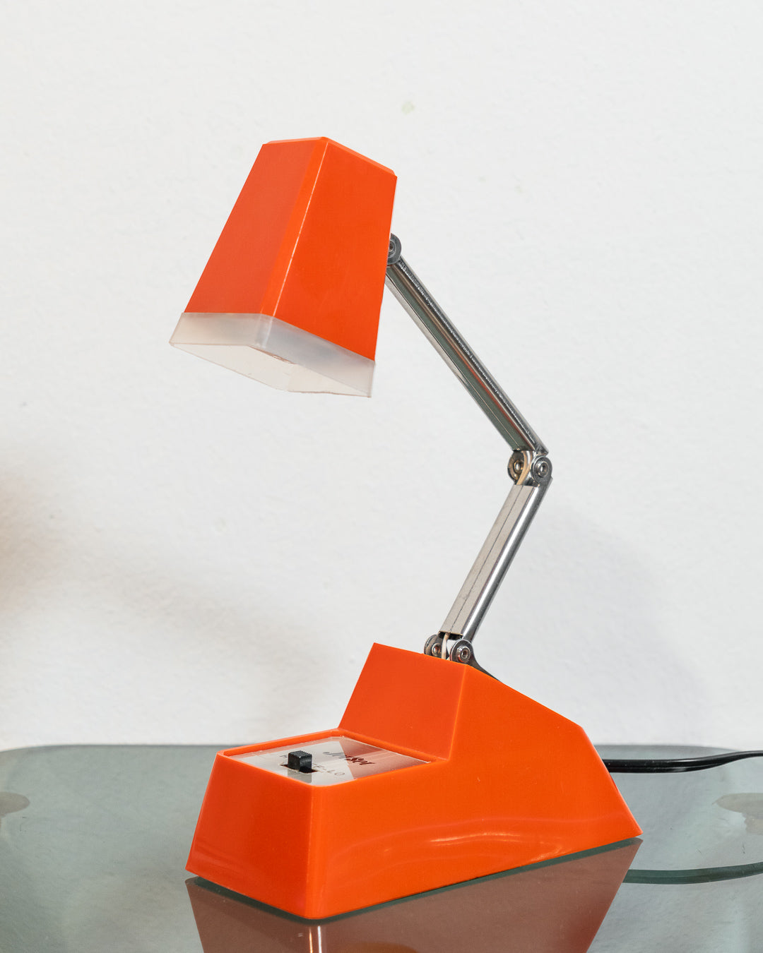 Rare vintage Cleve-Lite JetSet folding lamp in orange plastic. 1970s space age design with night light function. Includes original box– Vecino Shop