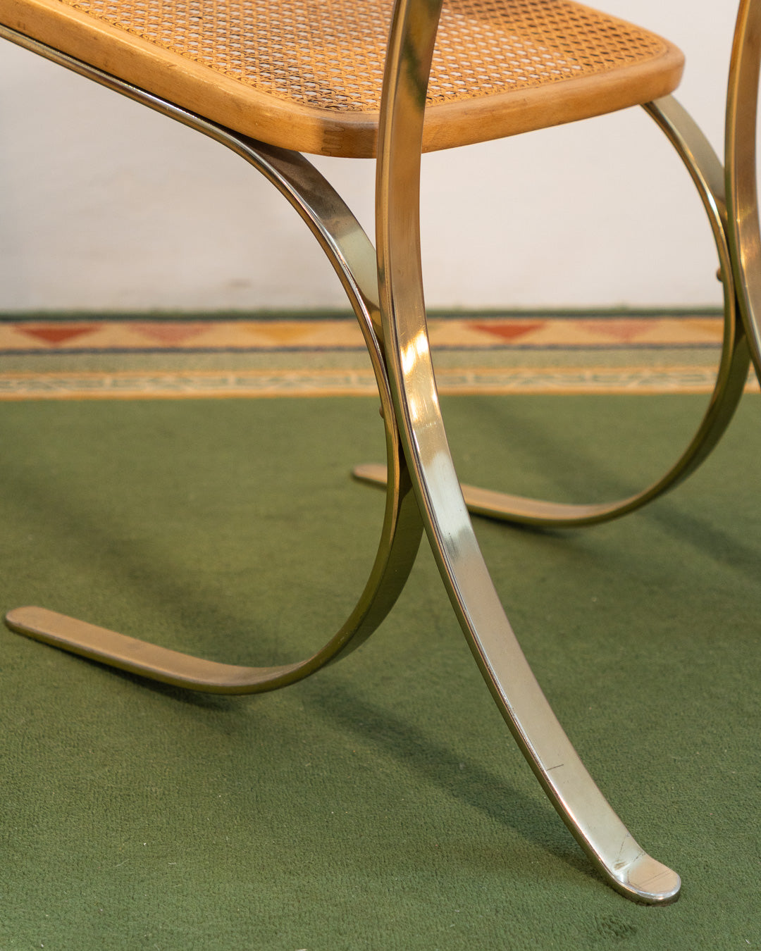 Rare 1970s vintage chair with gold metal frame, wooden seat and rattan backrest, iconic design – Vecino Shop