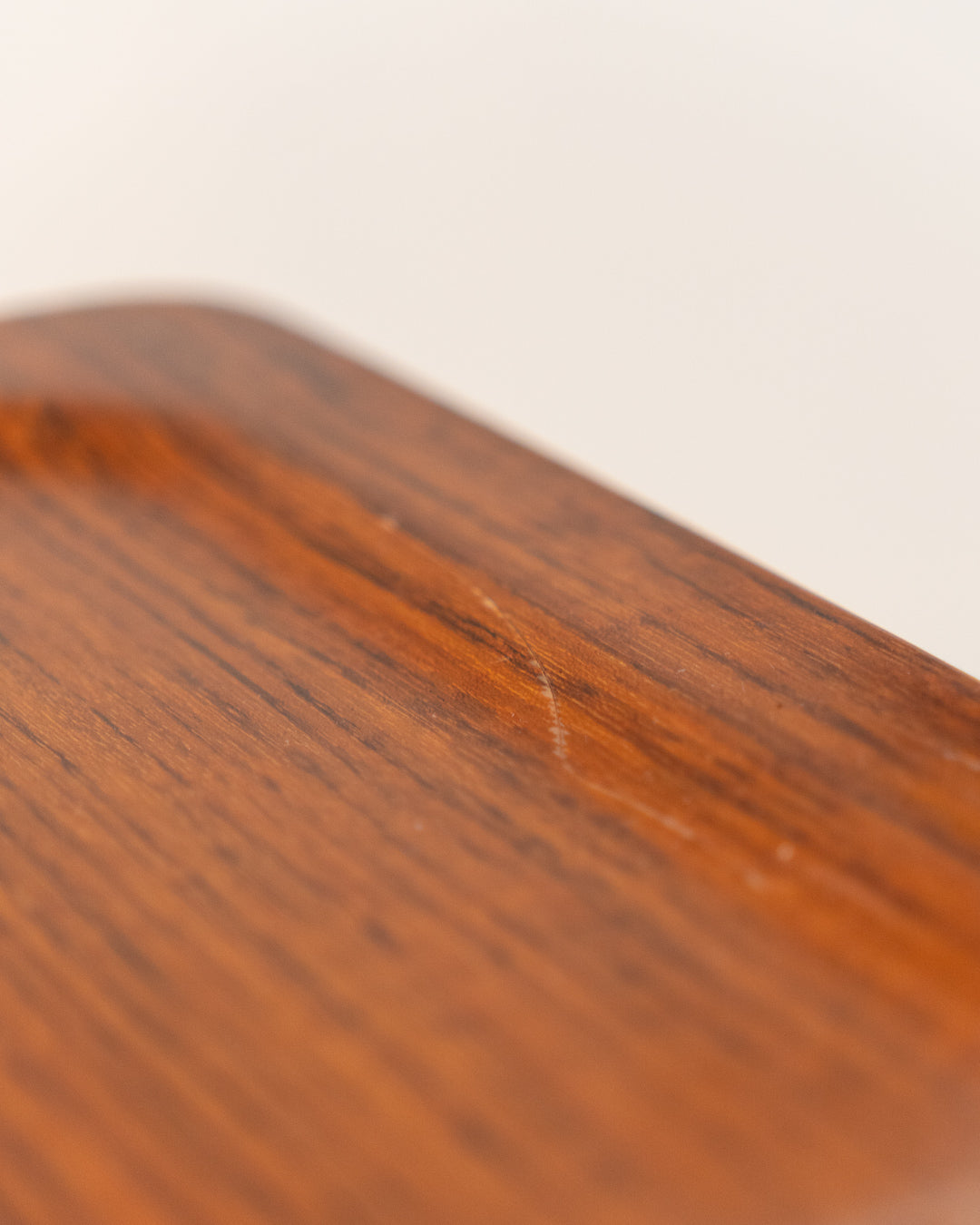 1960s mid-century rolling side table, wood veneer top, chrome frame, built-in bookcase. Vecino Shop