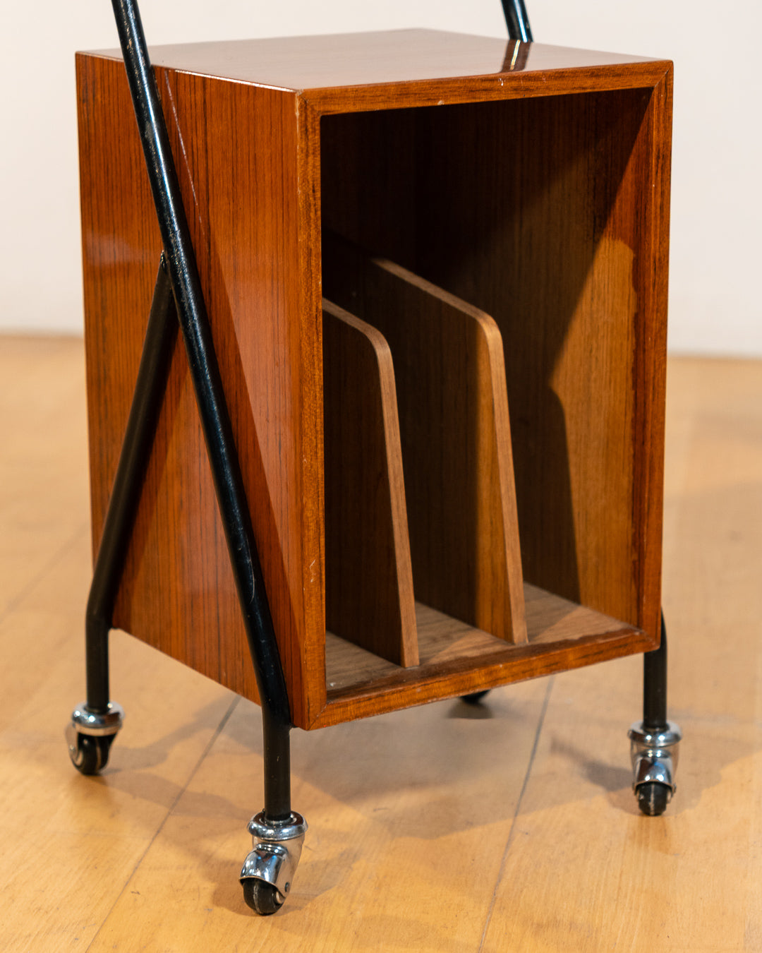 1960s mid-century rolling side table, wood veneer top, chrome frame, built-in bookcase. Vecino Shop