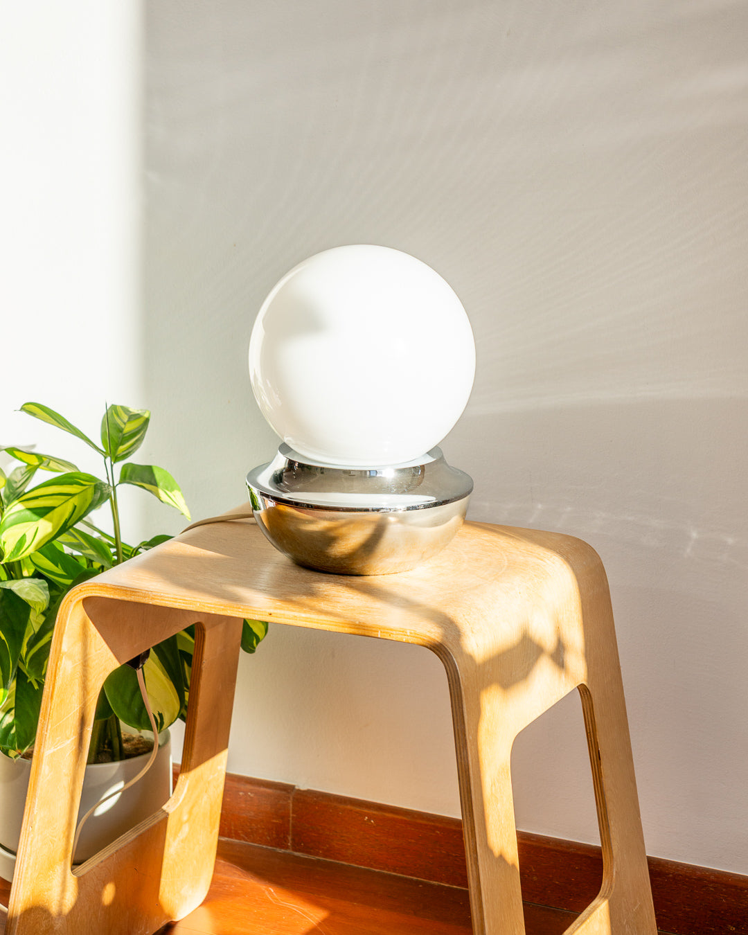 Vintage Space Age table lamp with opaline glass globe orb and chrome base, 1970s design