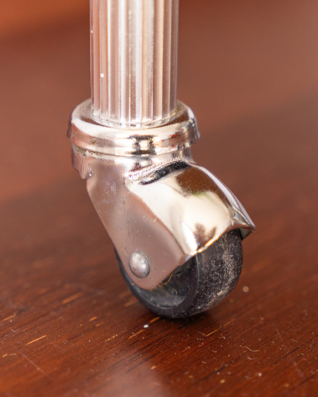 Vintage MCM 1960s chrome and wood veneer rolling table with drawer and caster wheels