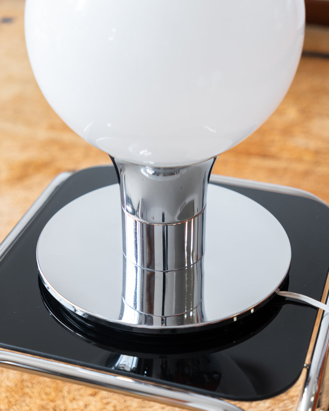 Vintage Space Age table lamp with sculptural chrome base and white opaline glass globe – Vecino Shop