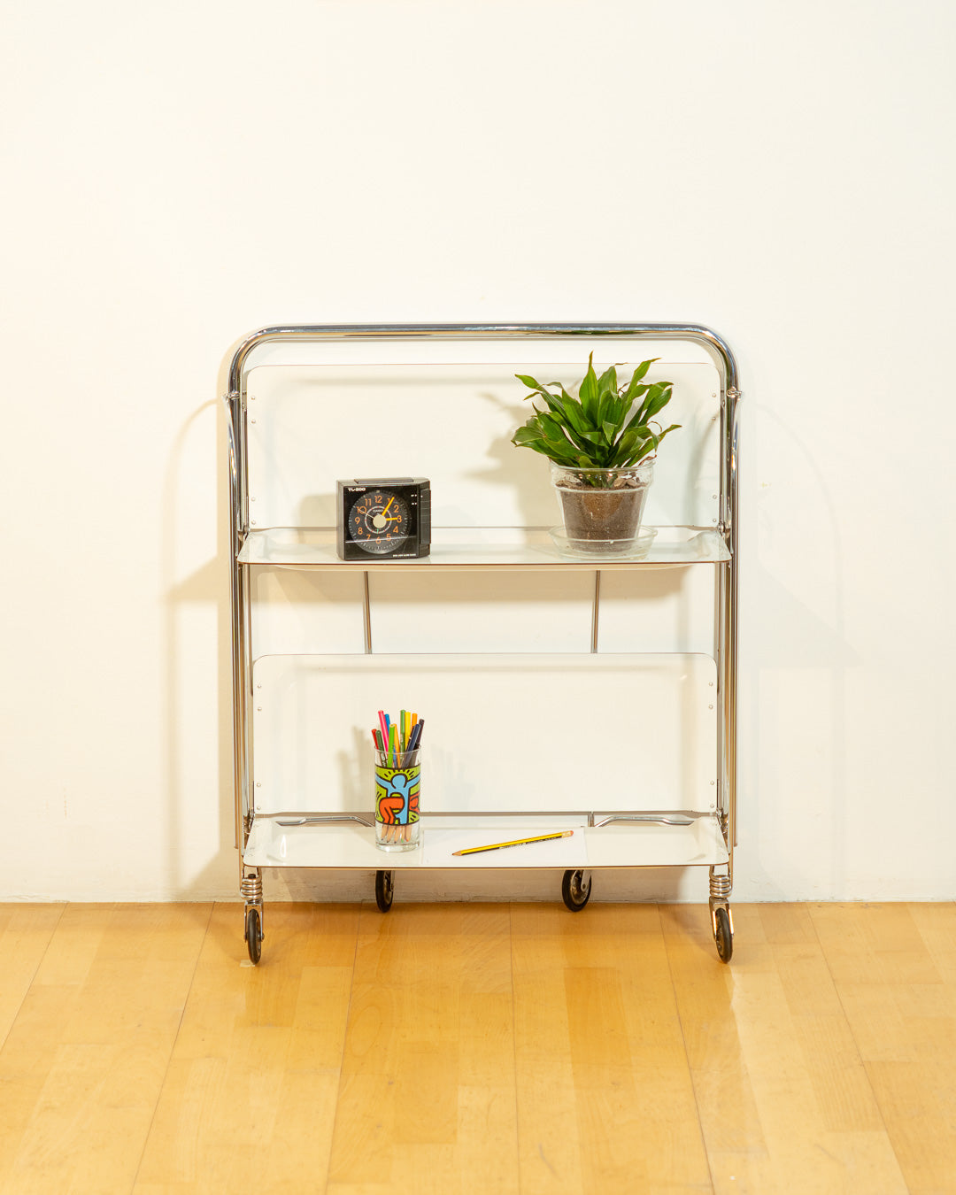 Vintage Raquer folding serving trolley 1960s, chrome frame with white shelves, Mid-Century design, compact foldable bar cart, similar to Dinnet and other classic European brands – Vecino Shop