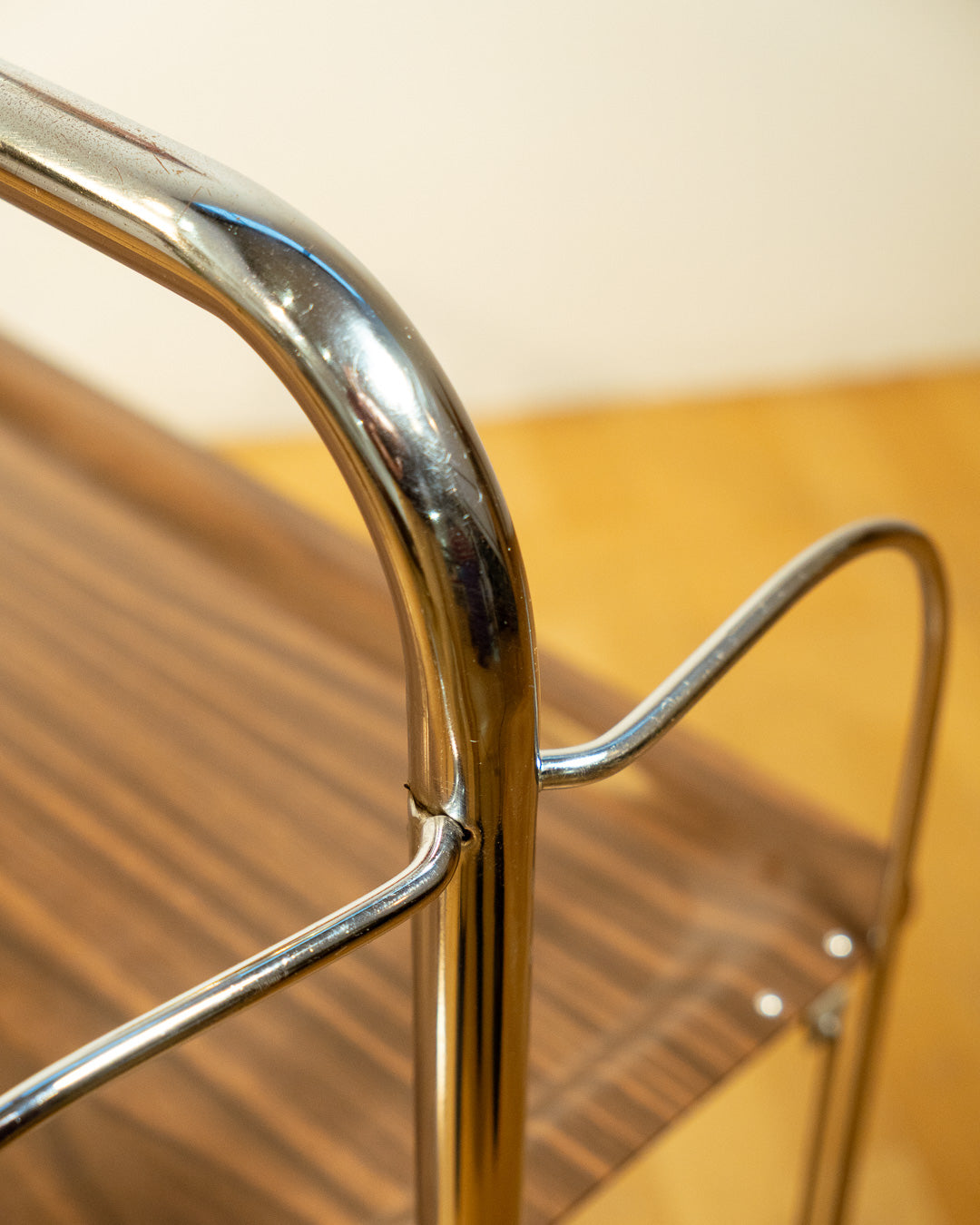 Vintage Raquer folding serving trolley 1960s, chrome frame with dark wood veneer shelves, Mid-Century design, compact foldable bar cart, similar to Dinnet and other classic European brands – Vecino Shop