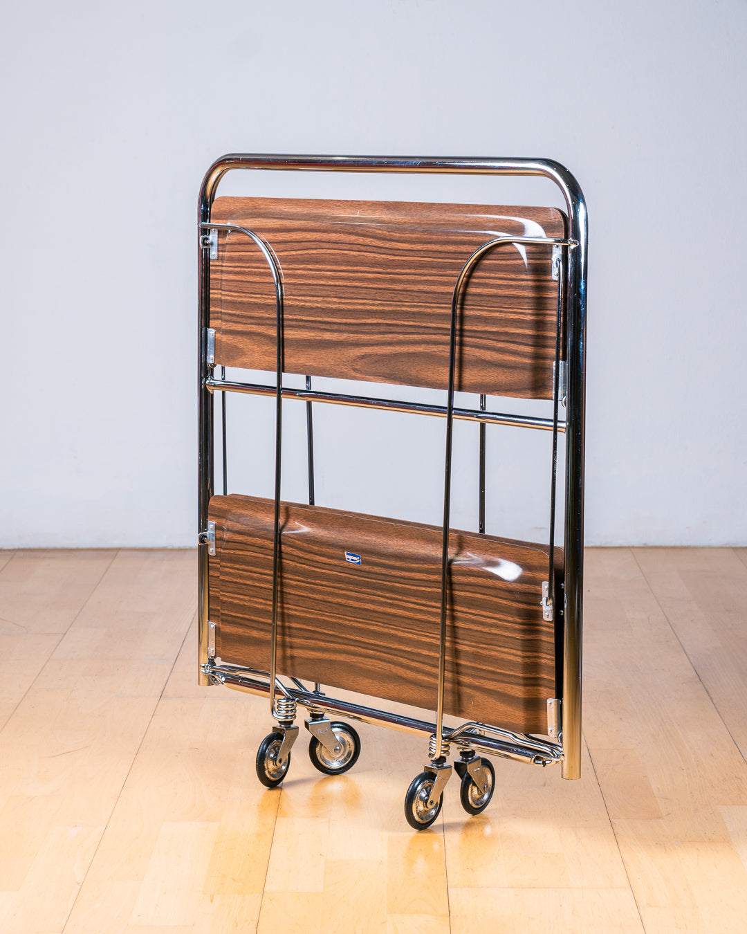 Vintage 1960s Raquer dark woodgrain folding trolley with  Formica shelves and chrome details. Bar Cart, drinks trolley. Mid Century Modern. Vecino Shop