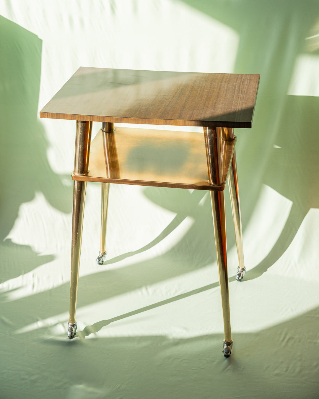 Vintage Scandinavian side table with tapered legs and clean lines. A Mid-Century Modern gem from the 1960s. Warm wood tone and minimalist elegance - Vecino Shop