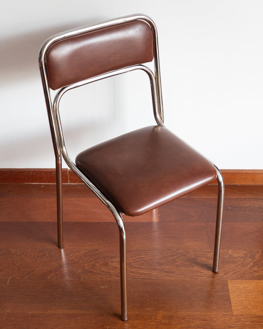 Set of five 1970s–80s Bauhaus-style chrome chairs with brown vinyl upholstery.