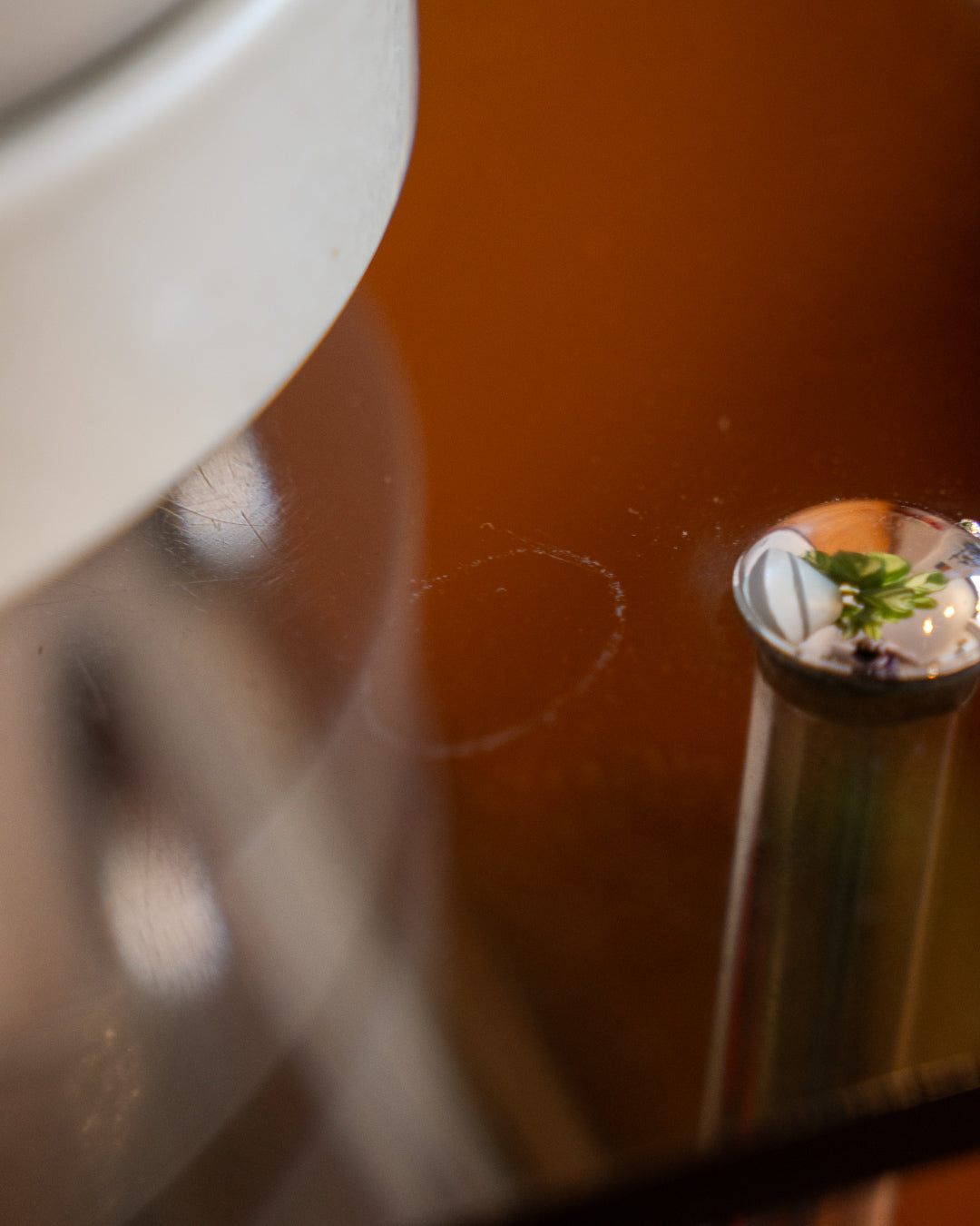 Chrome side table with acrylic and smoked glass shelves, 1970s vintage.