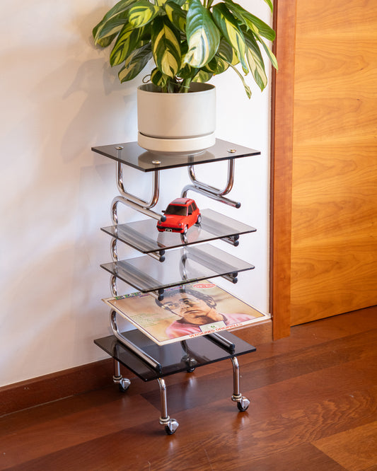 Chrome side table with acrylic and smoked glass shelves, 1970s vintage.