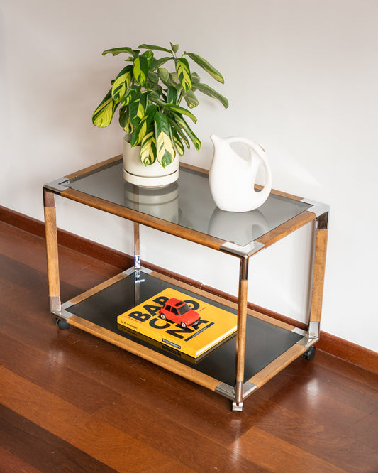 Vintage 1970s wooden side table with smoked glass shelves and chrome corner joints, two-tier, minor wear | Vecino Shop