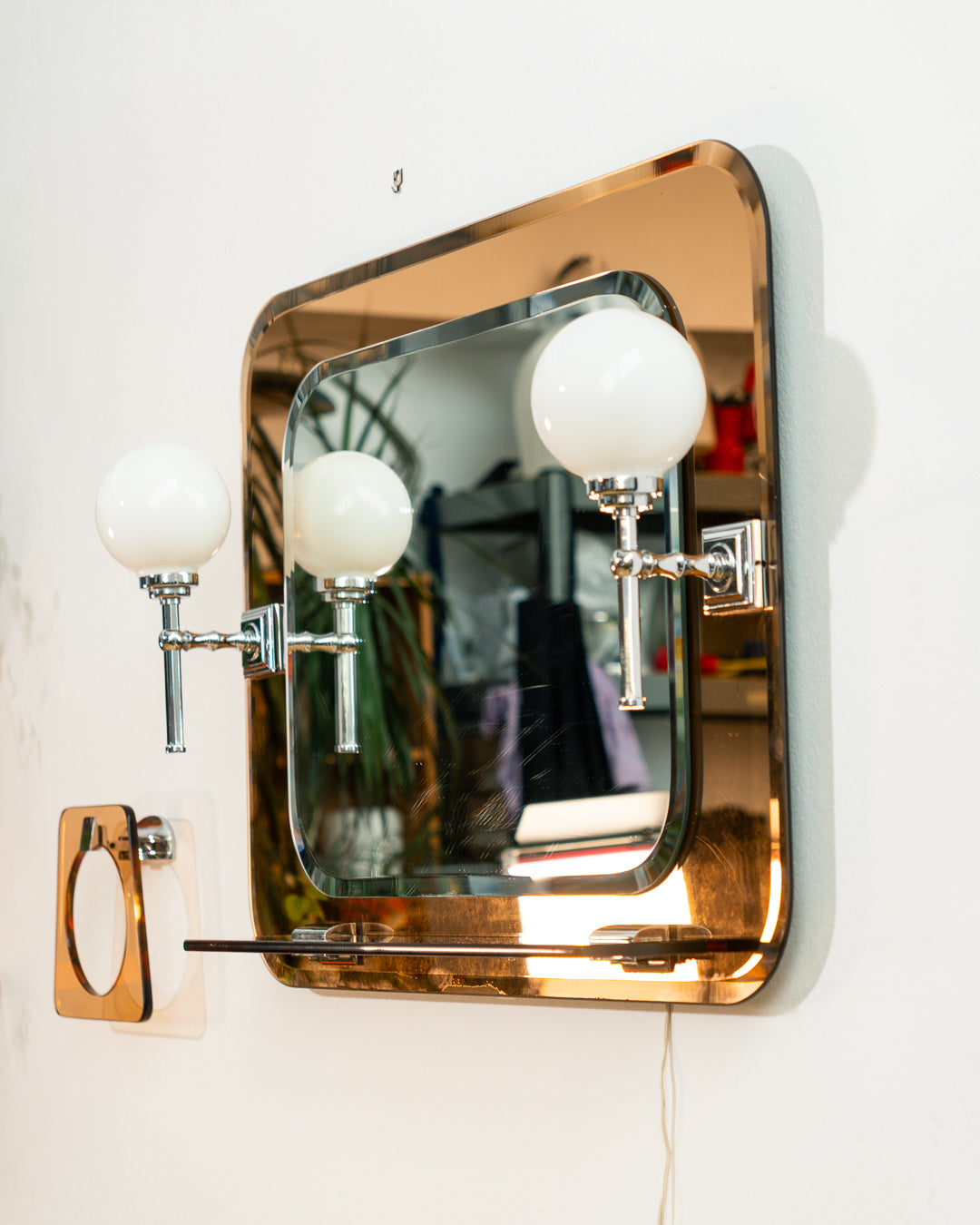 Vintage Space Age smoked pink glass bathroom set from the 1970s with illuminated mirror, shelf, towel holder and toilet paper holder. Vecino Shop