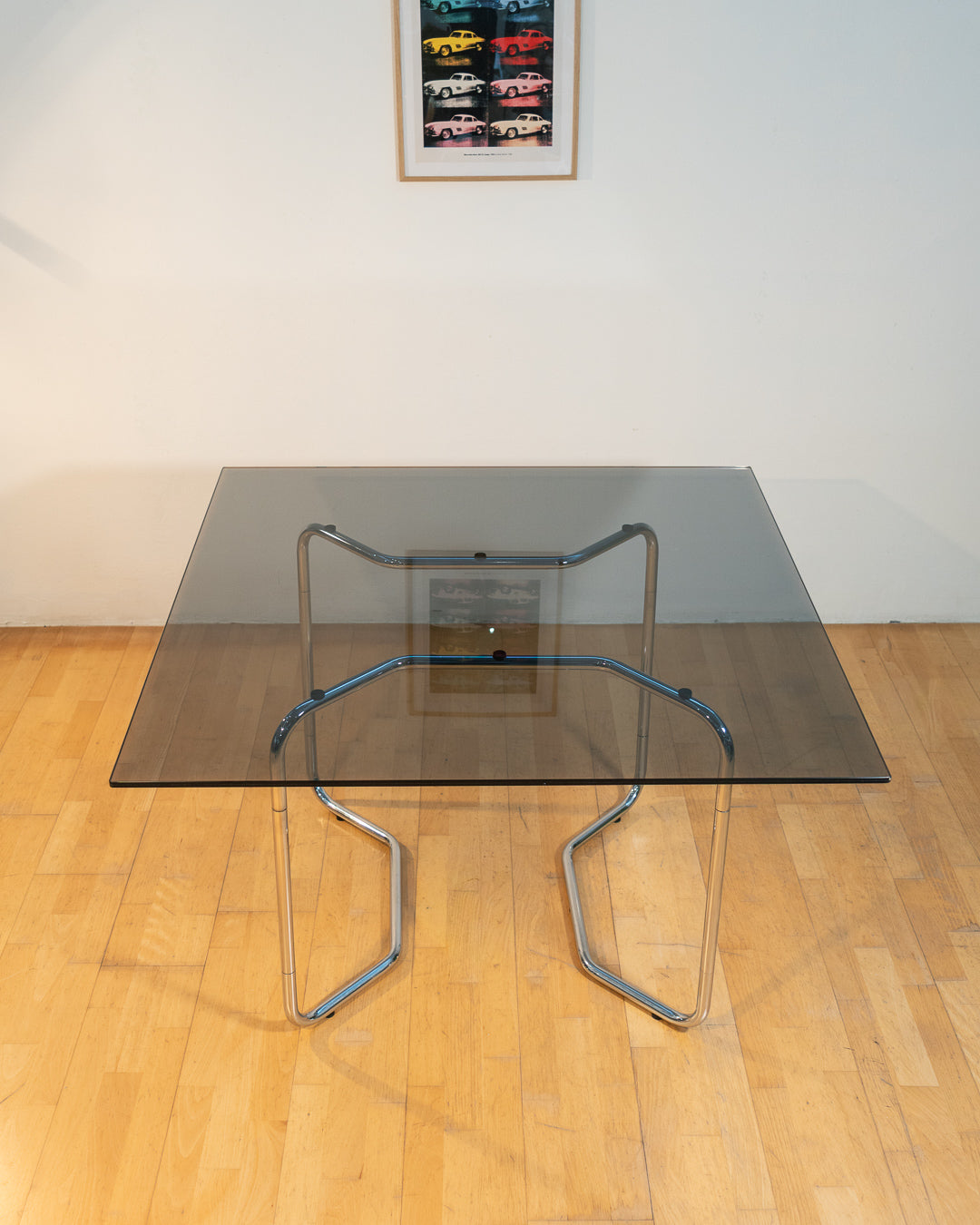 Rare 1970s Space Age dining table with tubular chrome frame and smoked glass top. Vintage piece in excellent condition. Vecino Shop