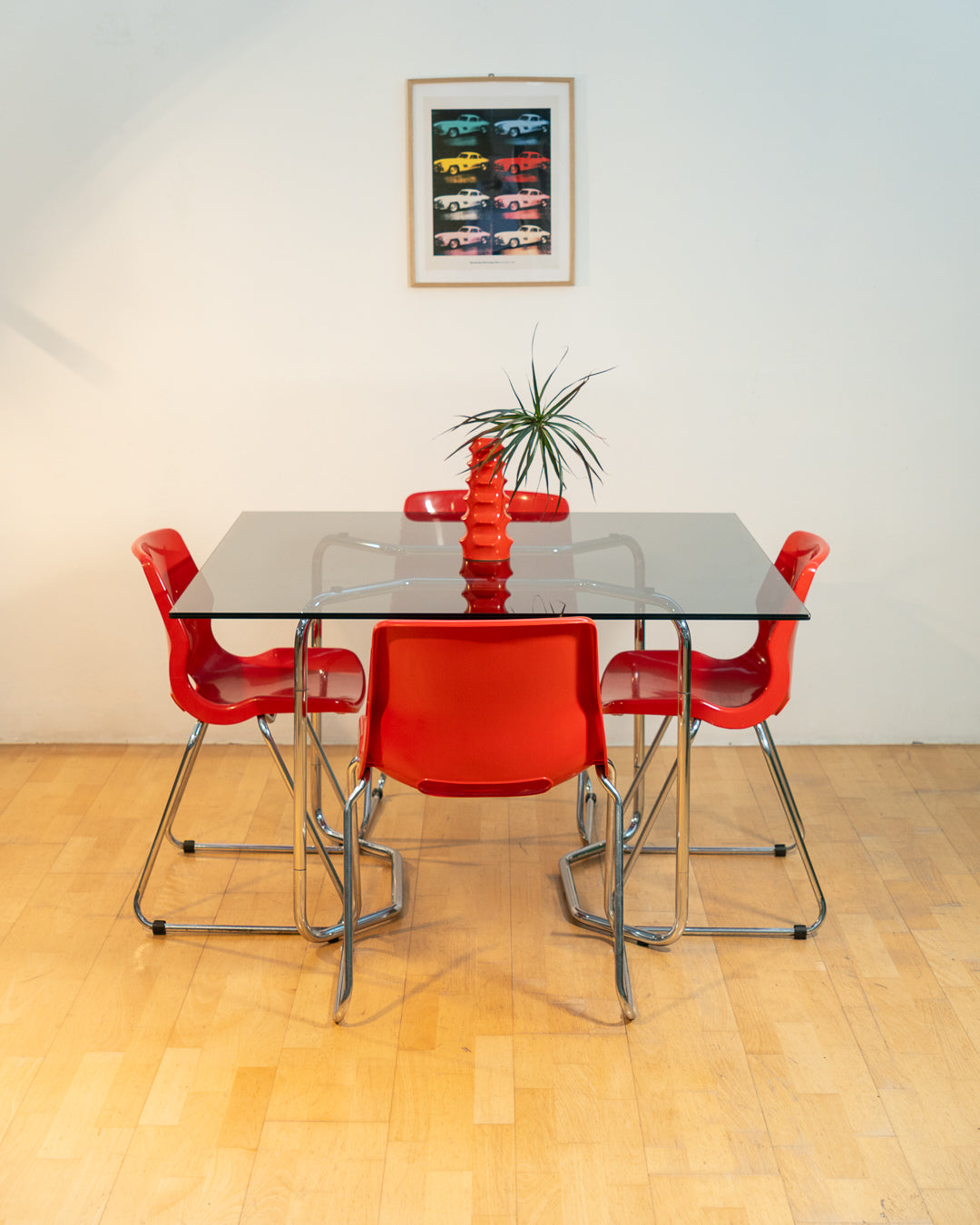 Set of 4 vintage Overman chairs in cherry red plastic with chrome frames, 1970s Swedish design by Svante Schöblom. Vecino Shop