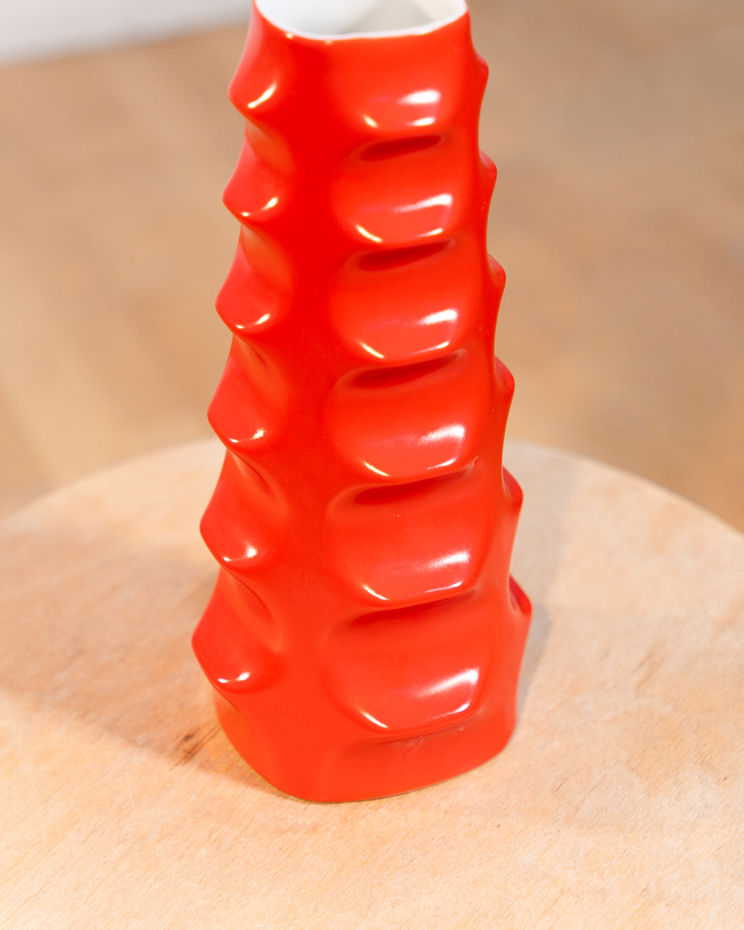 Vintage Molina Badalona ceramic flower vase from the 1970s in matte bright red glaze with wavy textured surface. Vecino Shop