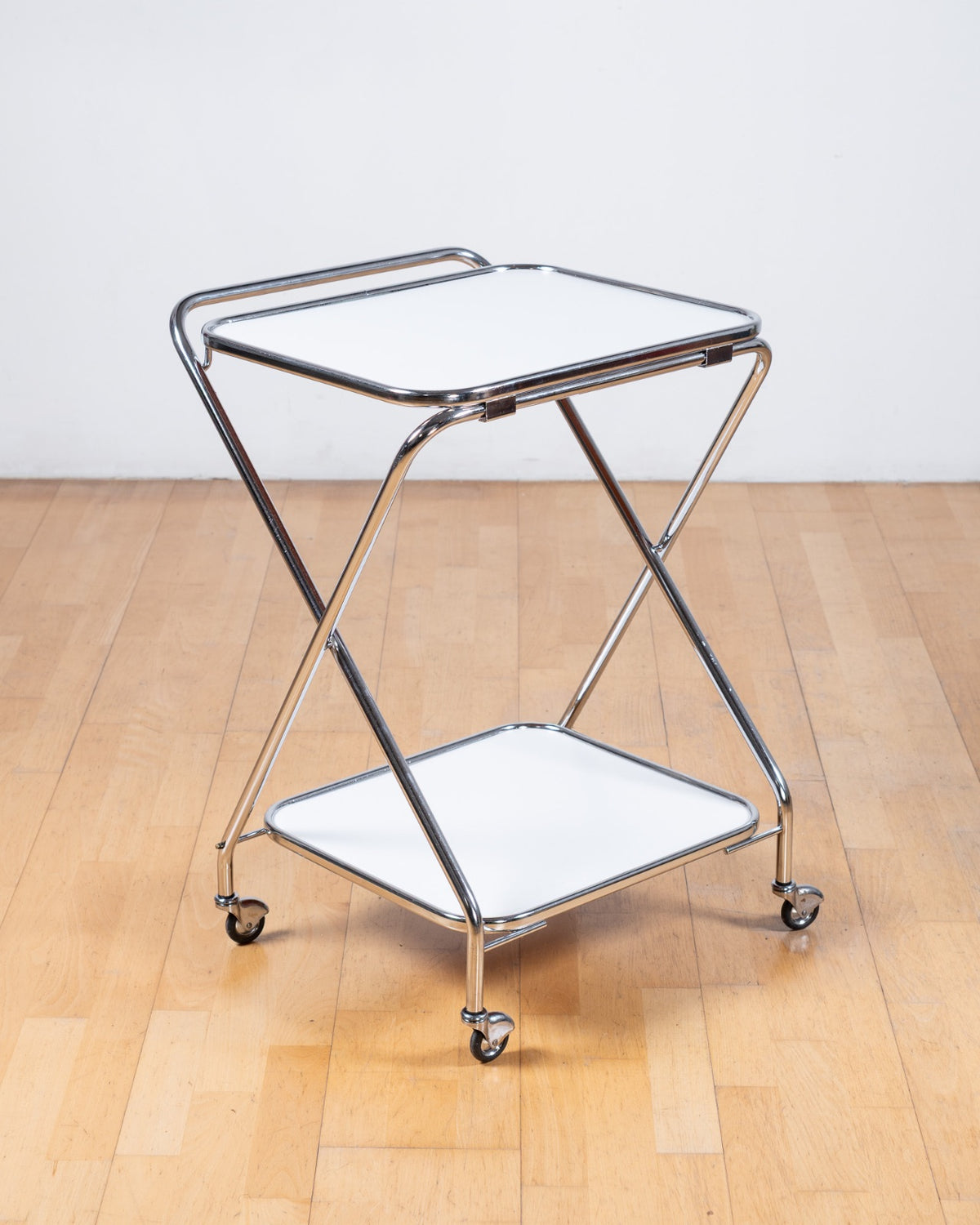 Vintage 1970s white Formica folding two-tier trolley with chrome X-shaped tubular frame and castors – Vecino Shop