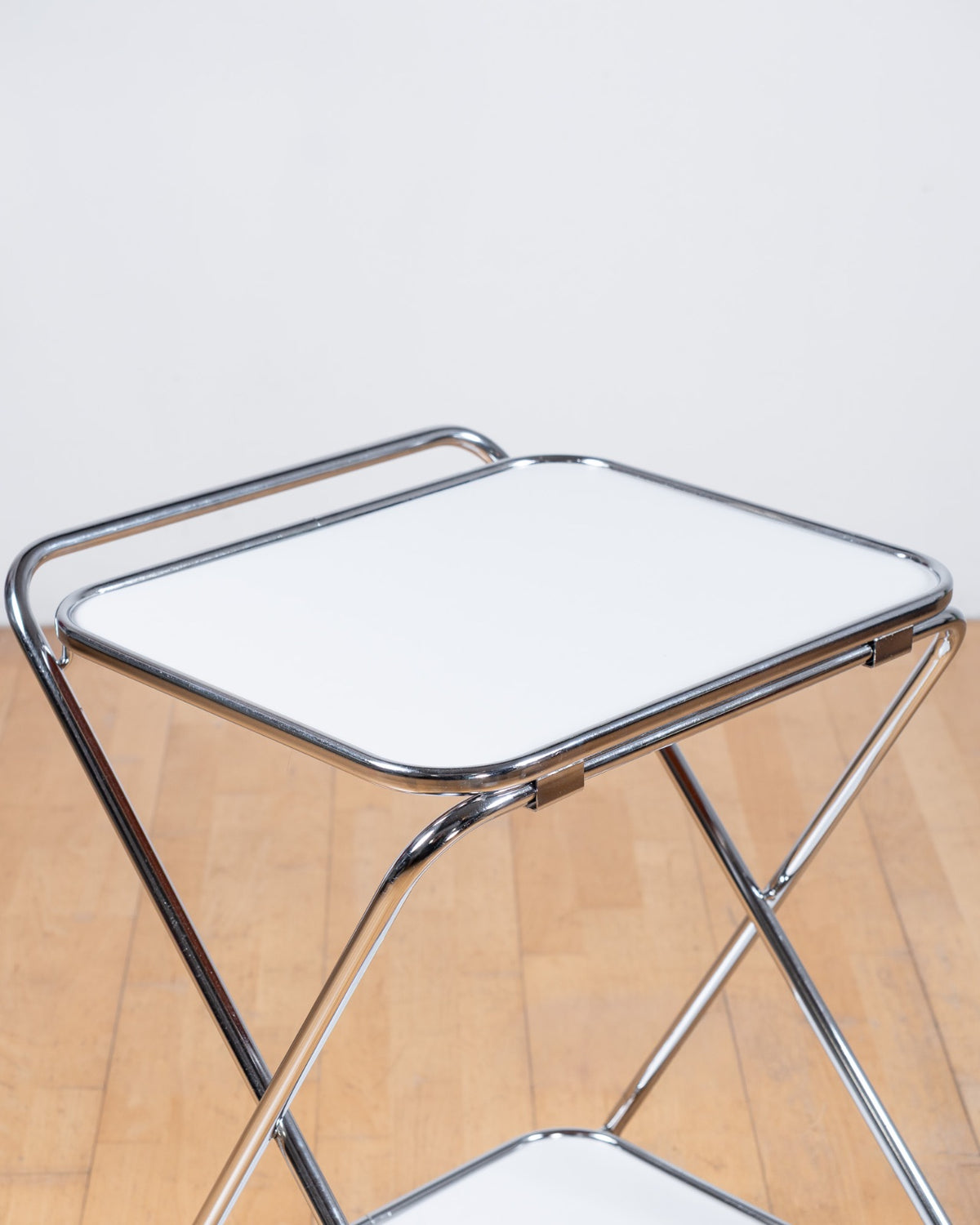 Vintage 1970s white Formica folding two-tier trolley with chrome X-shaped tubular frame and castors – Vecino Shop