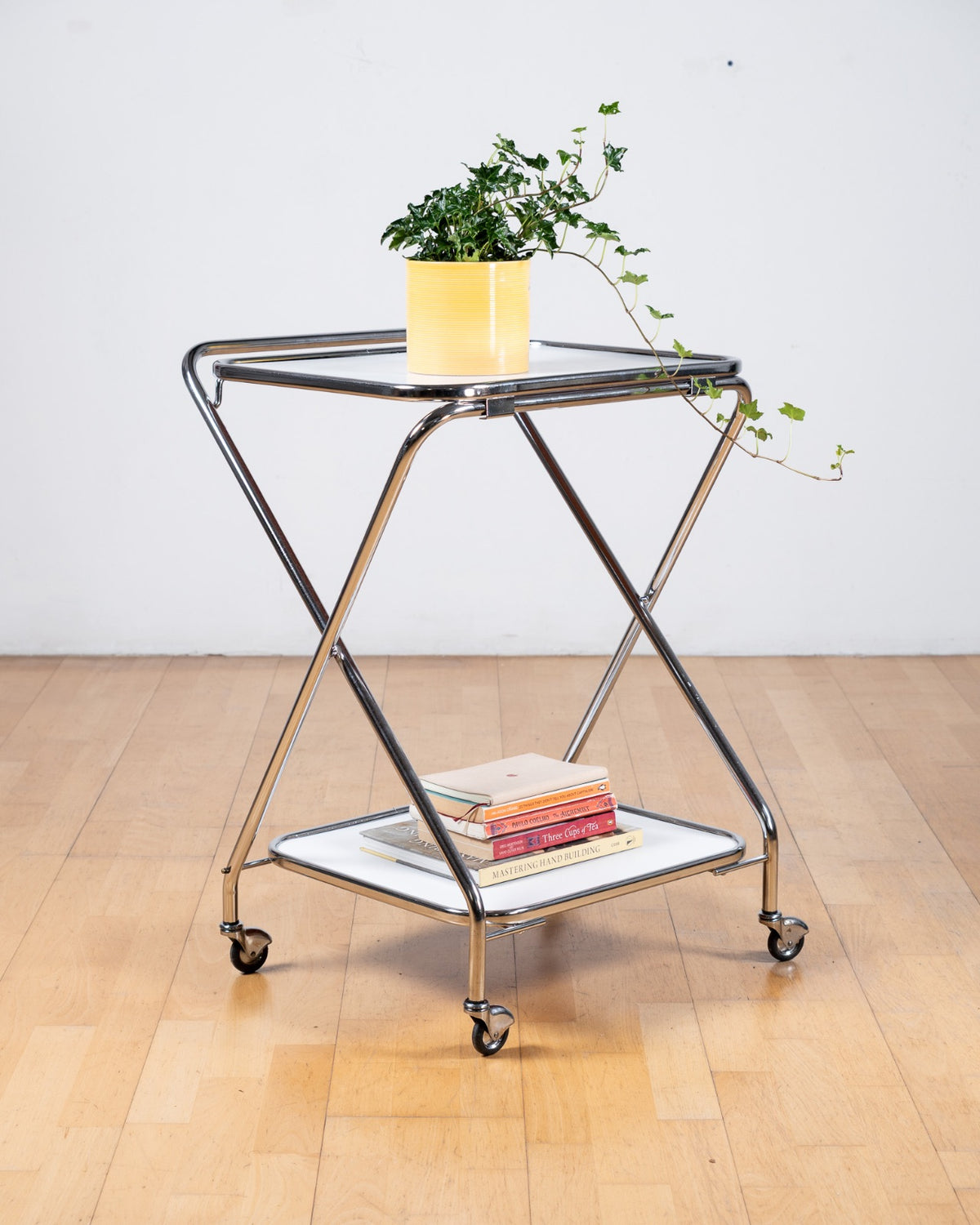 Vintage 1970s white Formica folding two-tier trolley with chrome X-shaped tubular frame and castors – Vecino Shop
