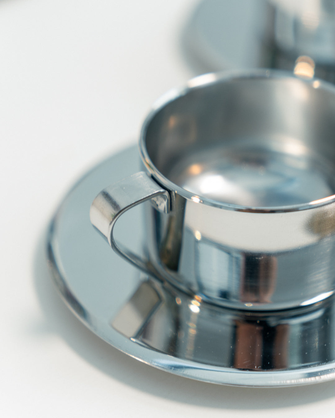 Vintage 1970s Italian double-walled stainless steel espresso set with six cups, saucers and matching sugar server. Vecino Shop