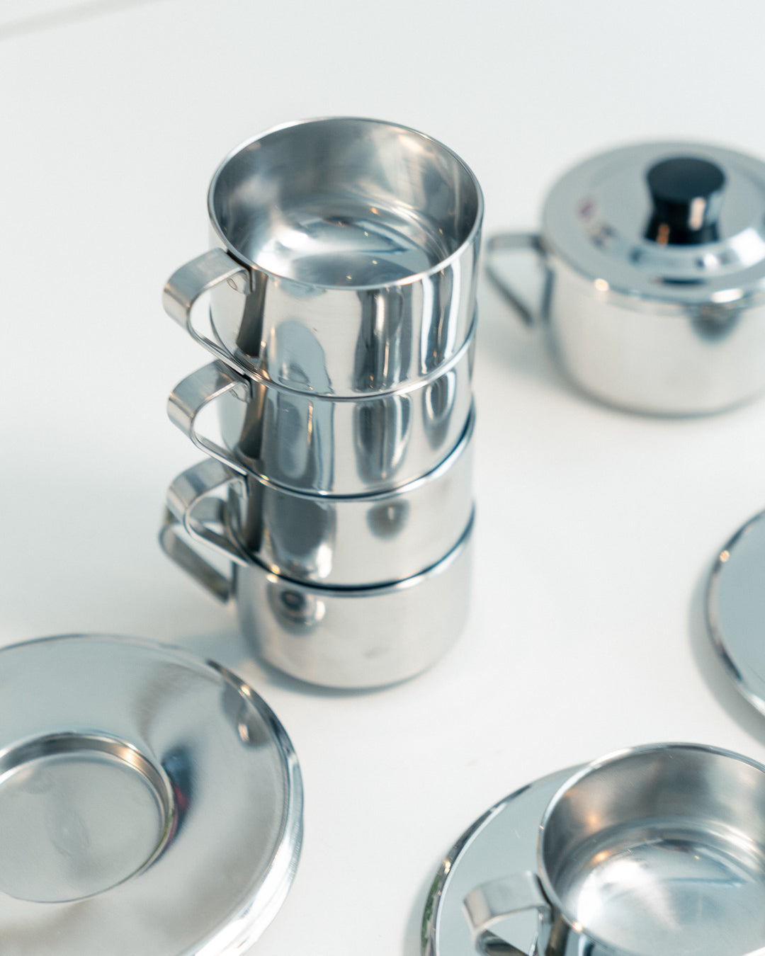 Vintage 1970s Italian double-walled stainless steel espresso set with six cups, saucers and matching sugar server. Vecino Shop