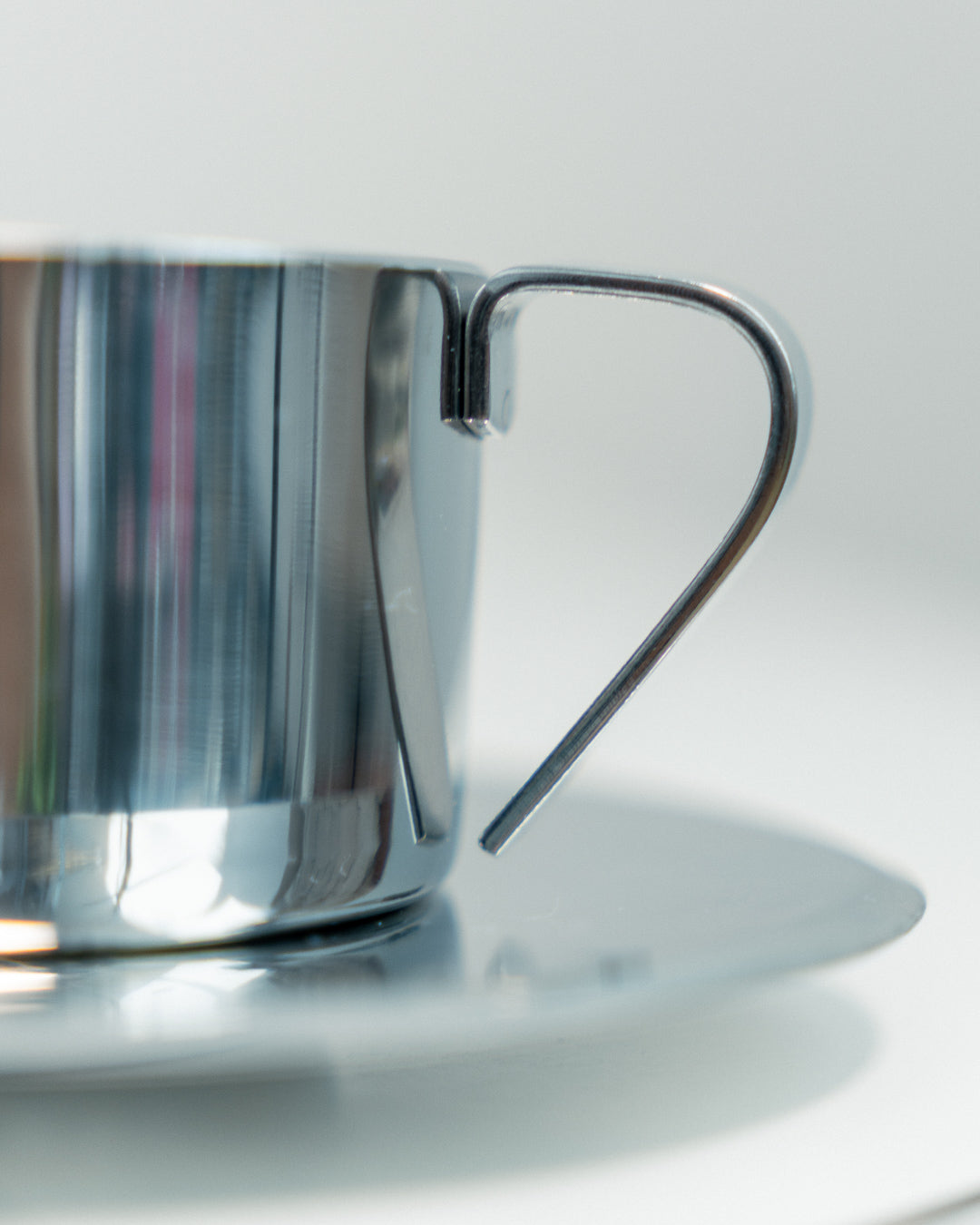 Vintage 1970s Italian double-walled stainless steel espresso set with six cups, saucers and matching sugar server. Vecino Shop