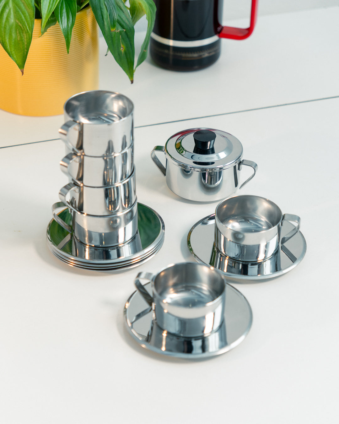 Vintage 1970s Italian double-walled stainless steel espresso set with six cups, saucers and matching sugar server. Vecino Shop