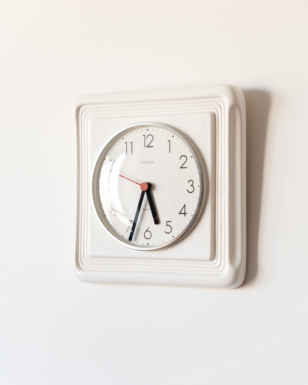 Vintage 1970s Kienzle ceramic wall clock, Mid-Century design, rare and unique, made in Germany.