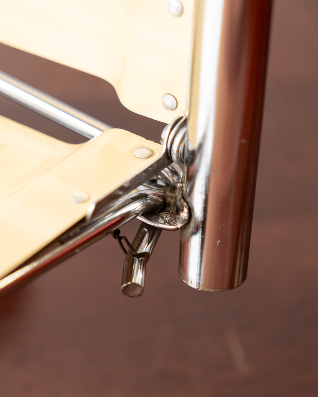 Vintage 1970s Raquer folding serving trolley with chrome frame and light wood veneer shelves