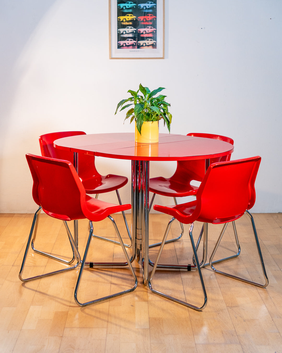Vintage 1970s red Formica folding dining table with chrome frame and space-saving folding mechanism in Space Age style. Vecino Shop