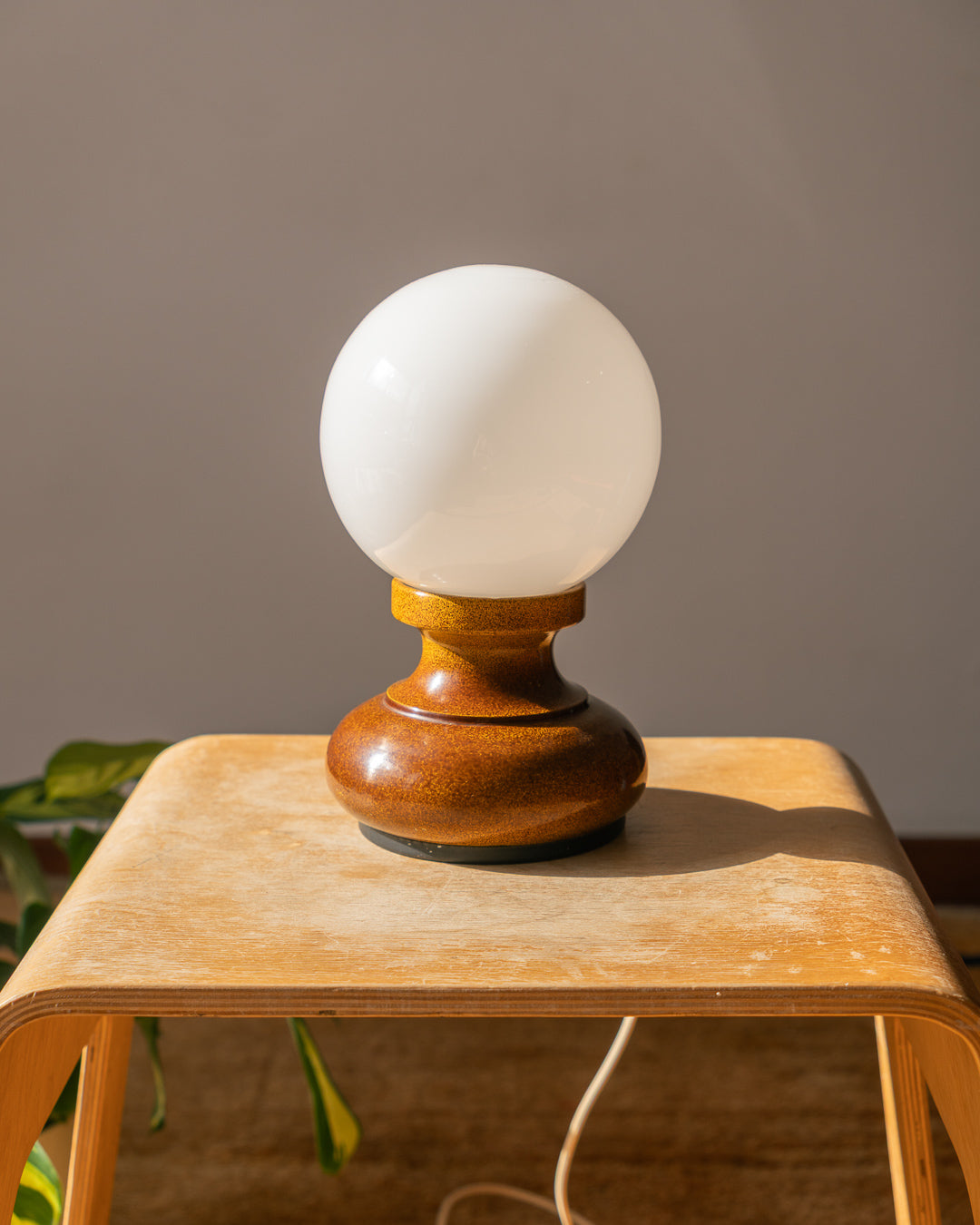 Vintage 1970s Space Age table lamp with speckled brown metal base and white opaline glass shade – Vecino Shop