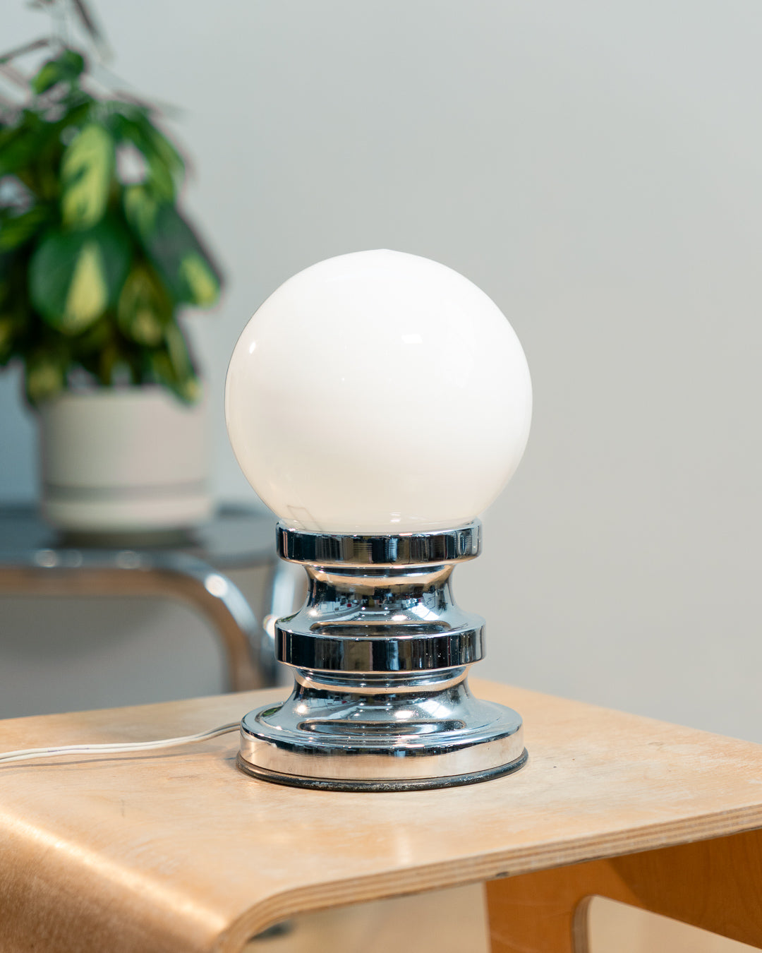 Vintage 1970s opaline orb table lamp with chrome base, Space Age design and soft glowing glass shade. Vecino Shop
