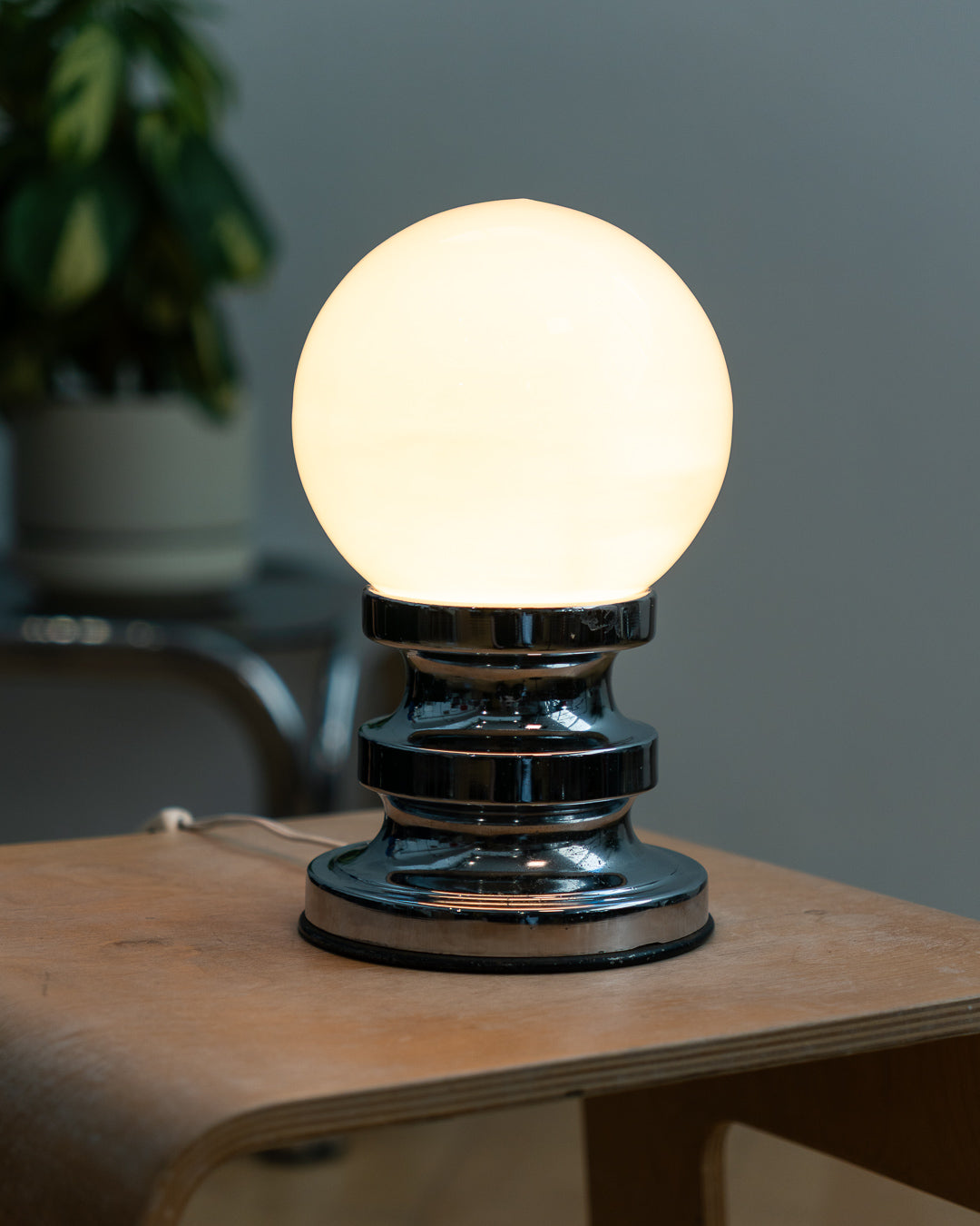 Vintage 1970s opaline orb table lamp with chrome base, Space Age design and soft glowing glass shade. Vecino Shop