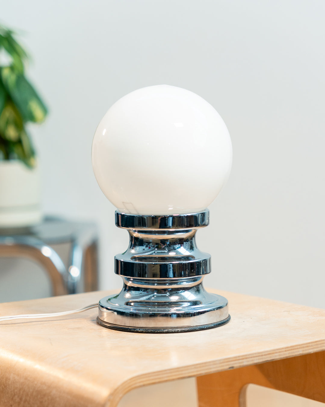 Vintage 1970s opaline orb table lamp with chrome base, Space Age design and soft glowing glass shade. Vecino Shop