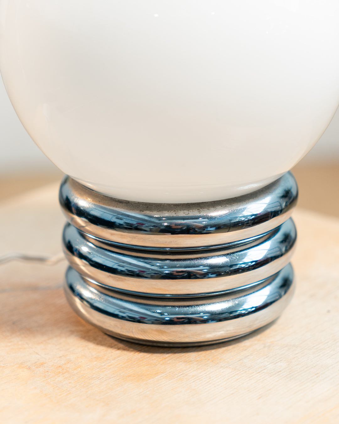 Vintage 1970s opaline orb table lamp with 3-banded chrome base, Space Age design. Two variants shown, Vecino Shop